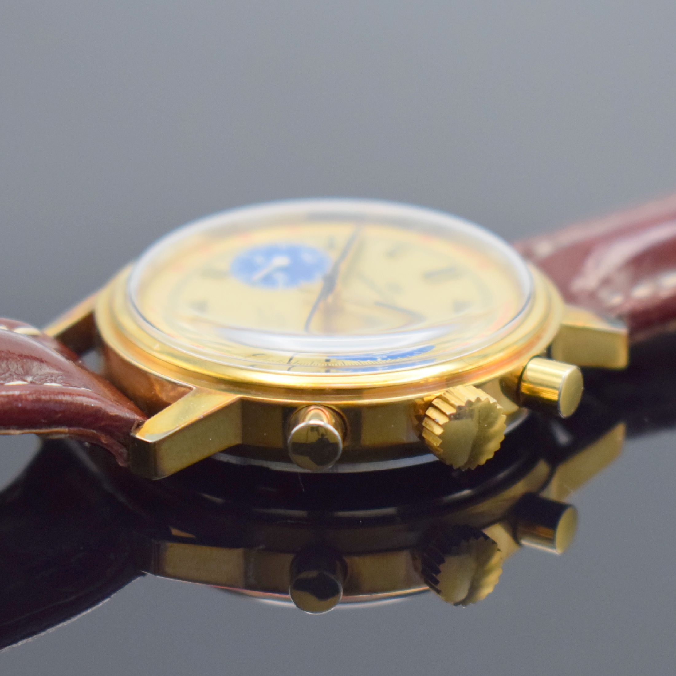 Detail c: WAKMANN Schaltradchronograph, Handaufzug, Schweiz 1967, verg. Metallgeh., verschr. Edelstahlboden & Werk bez. Charles Gigandet, gold. Zifferblatt m. ...