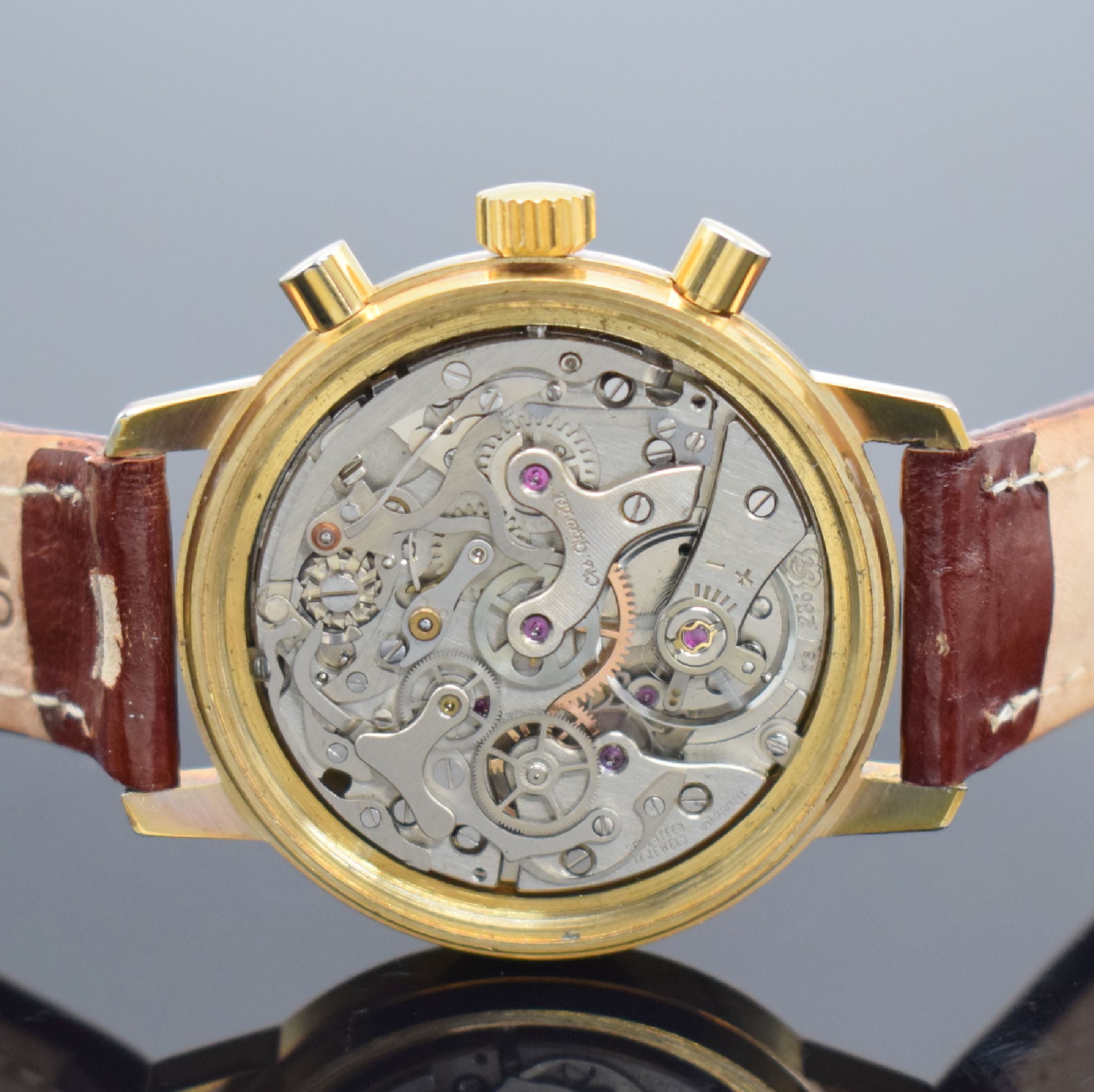 Detail d: WAKMANN Schaltradchronograph, Handaufzug, Schweiz 1967, verg. Metallgeh., verschr. Edelstahlboden & Werk bez. Charles Gigandet, gold. Zifferblatt m. ...