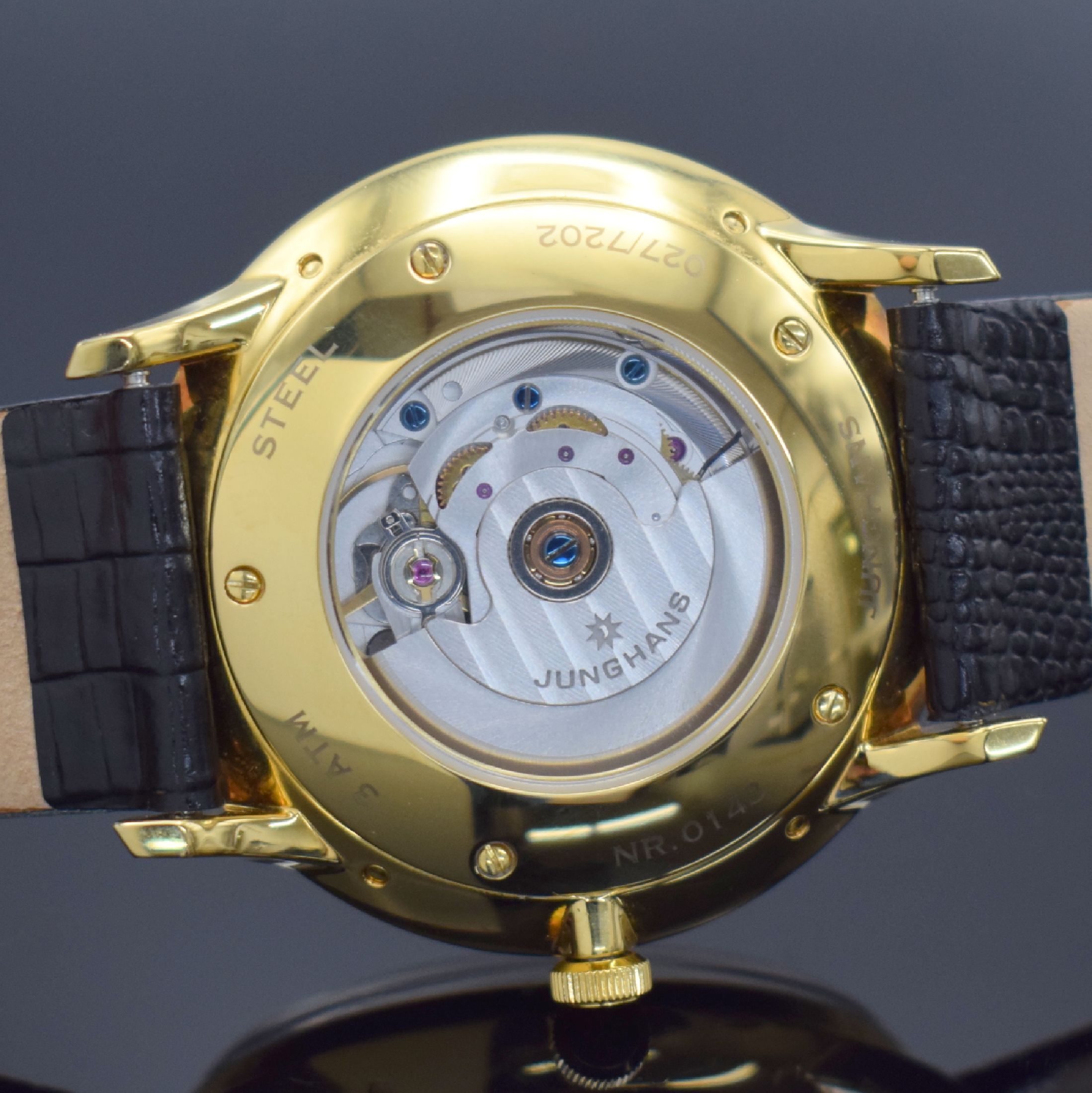 Detail e: JUNGHANS Meister Kalender Herrenarmbanduhr Referenz 027/7202.00, Automatik, verg. Edelstahlgeh. beids. verglast, Boden 5-fach verschr., vers. ...
