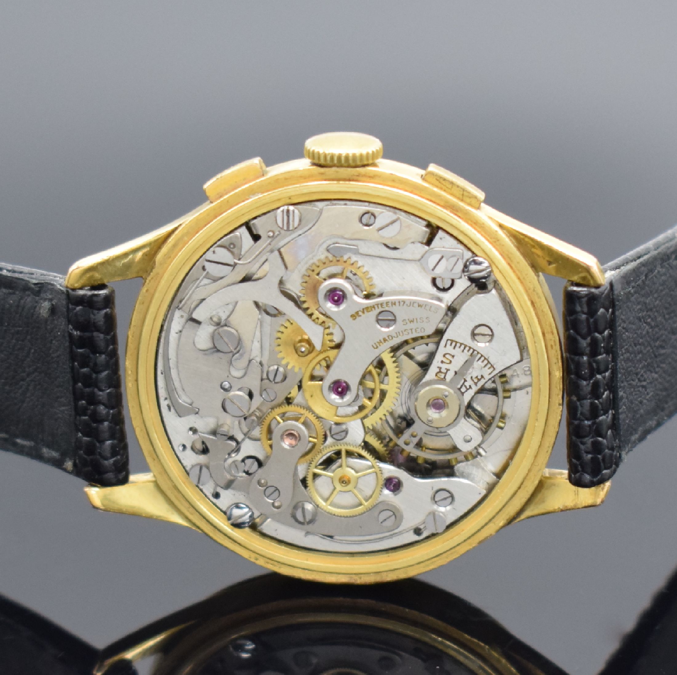 Detail d: ORATOR Herrenarmbanduhr mit Chronograph, Schweiz um 1945, Handaufzug, verg. Geh., Edelstahlboden aufgedr., schön erhaltenes silb. Zifferbl. m. gold. ...
