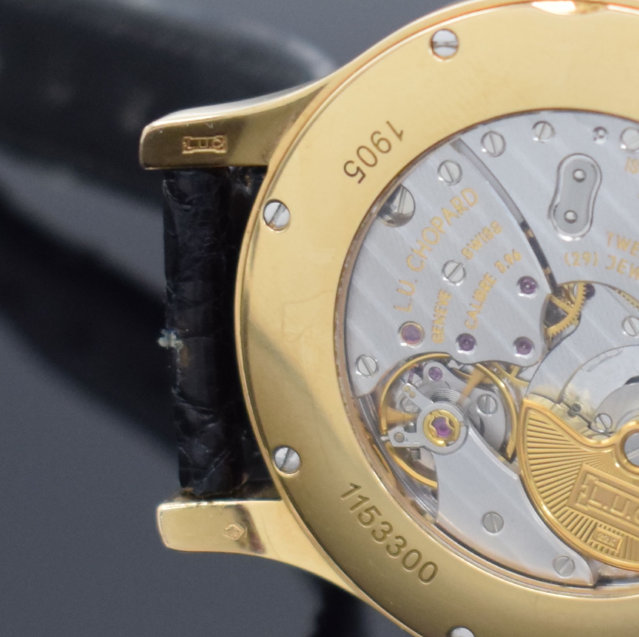 Detail d: CHOPARD Chronometre Herrenarmbanduhr in GG 750/000, Schweiz um 2010, Automatik, beids. Saphirvergl. Geh., Boden 8-fach verschr., Krone neutral ers., ...