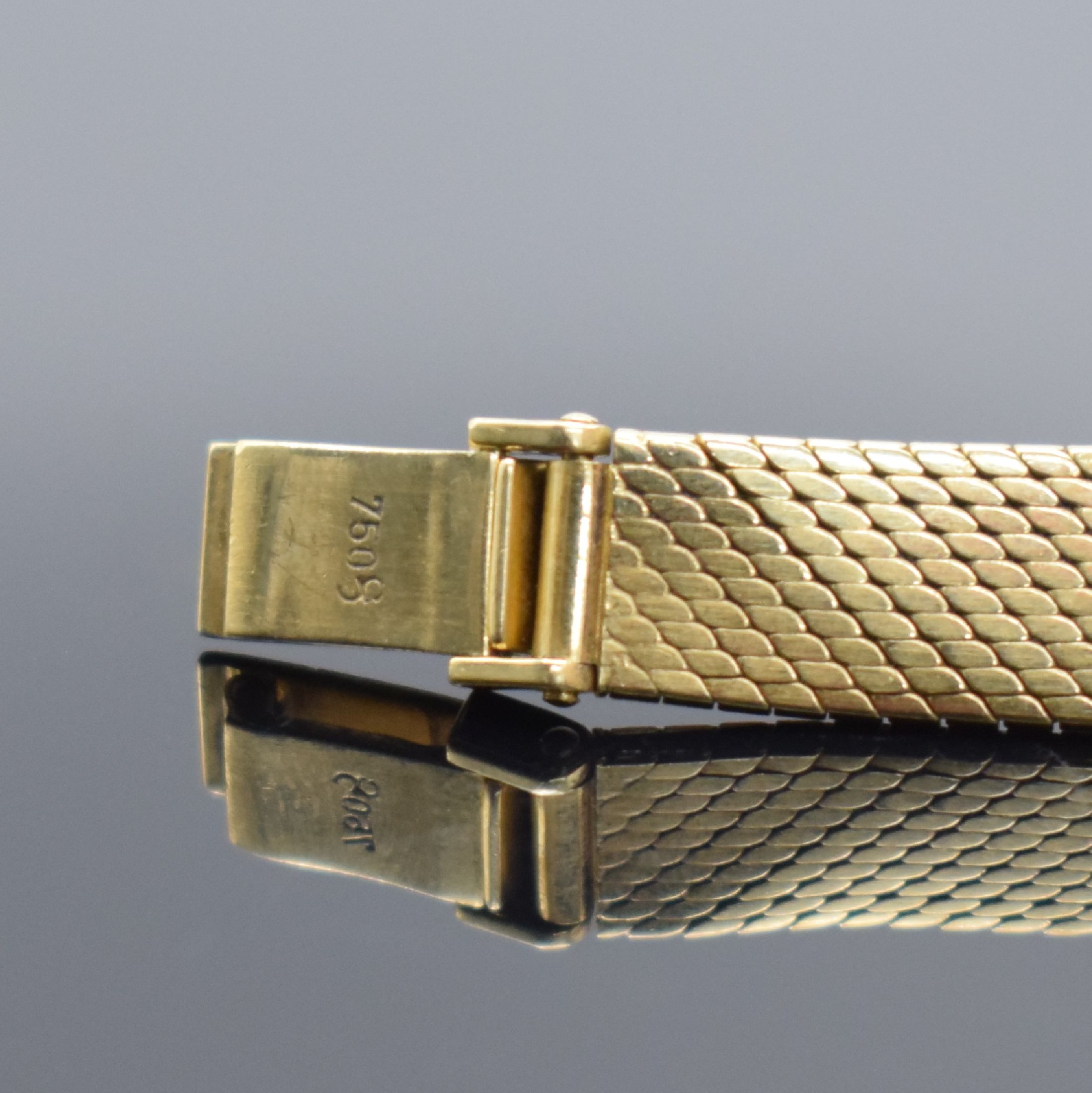 Detail b: ROLEX Damengoldbanduhr in GG 750/000, Schweiz um 1950, Handaufzug, Geh. an neutr. Goldband in GG 750/000, Boden aufgedr., silb. Zifferbl. m. gold. ...
