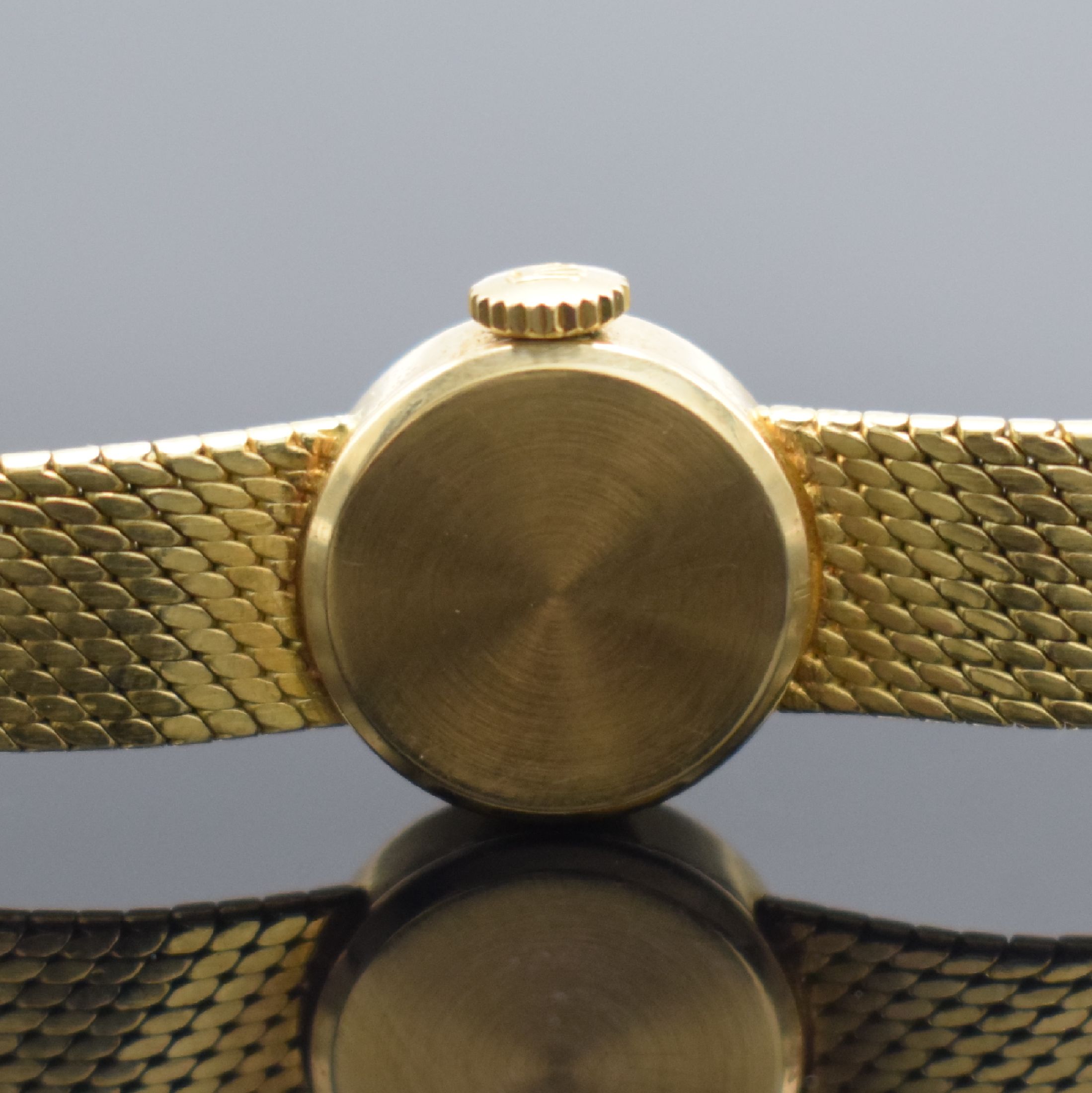 Detail d: ROLEX Damengoldbanduhr in GG 750/000, Schweiz um 1950, Handaufzug, Geh. an neutr. Goldband in GG 750/000, Boden aufgedr., silb. Zifferbl. m. gold. ...