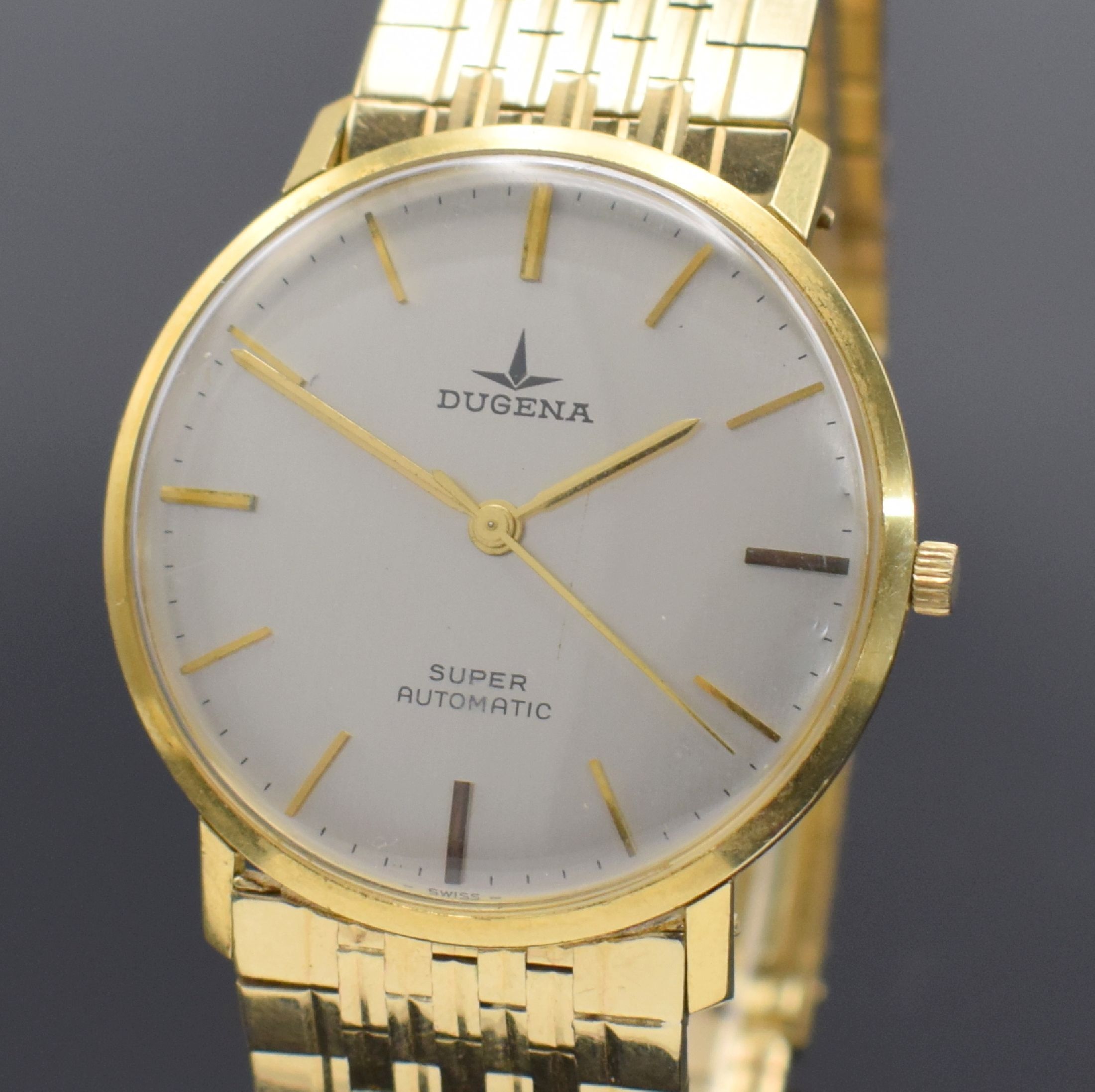 Detail a: DUGENA Herrenarmbanduhr Modell Super in GG 750/000, Schweiz um 1965, Automatik m. Microrotor, Boden aufgedr., neutr. GG 585/000 Band, silb. Zifferbl. ...