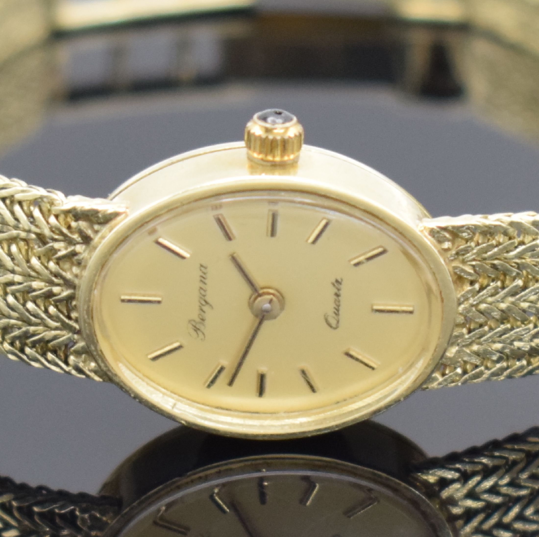 Detail a: BERGANA Damenarmbanduhr in GG 585/000, Schweiz um 1980, quarz, Geh. an Goldband in GG 585/000, champagnerfarb. Zifferbl. m. aufgel. Std.-Ind., gold. ...