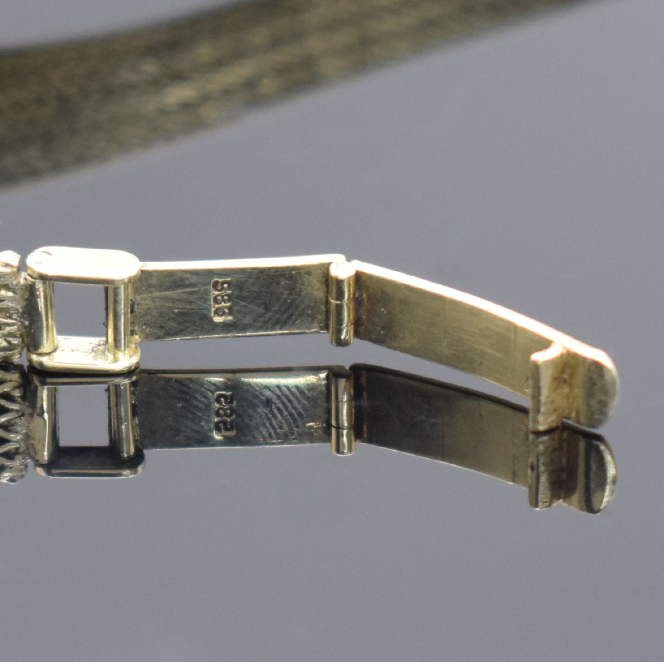 Detail b: BERGANA Damenarmbanduhr in GG 585/000, Schweiz um 1980, quarz, Geh. an Goldband in GG 585/000, champagnerfarb. Zifferbl. m. aufgel. Std.-Ind., gold. ...