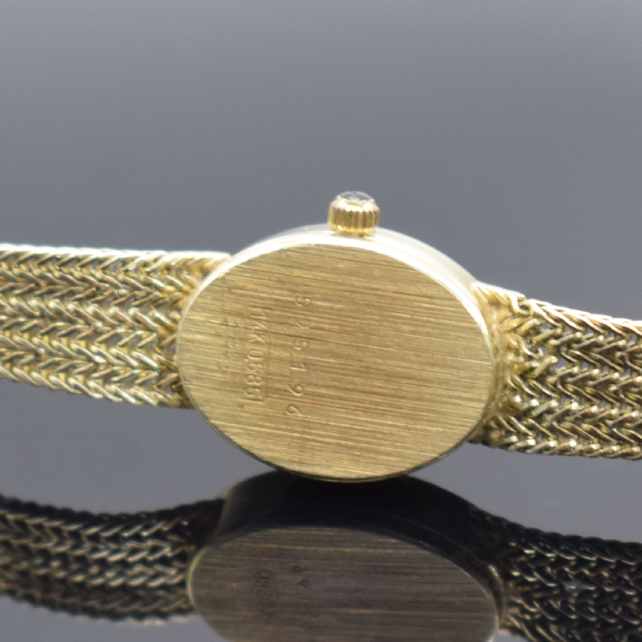 Detail c: BERGANA Damenarmbanduhr in GG 585/000, Schweiz um 1980, quarz, Geh. an Goldband in GG 585/000, champagnerfarb. Zifferbl. m. aufgel. Std.-Ind., gold. ...