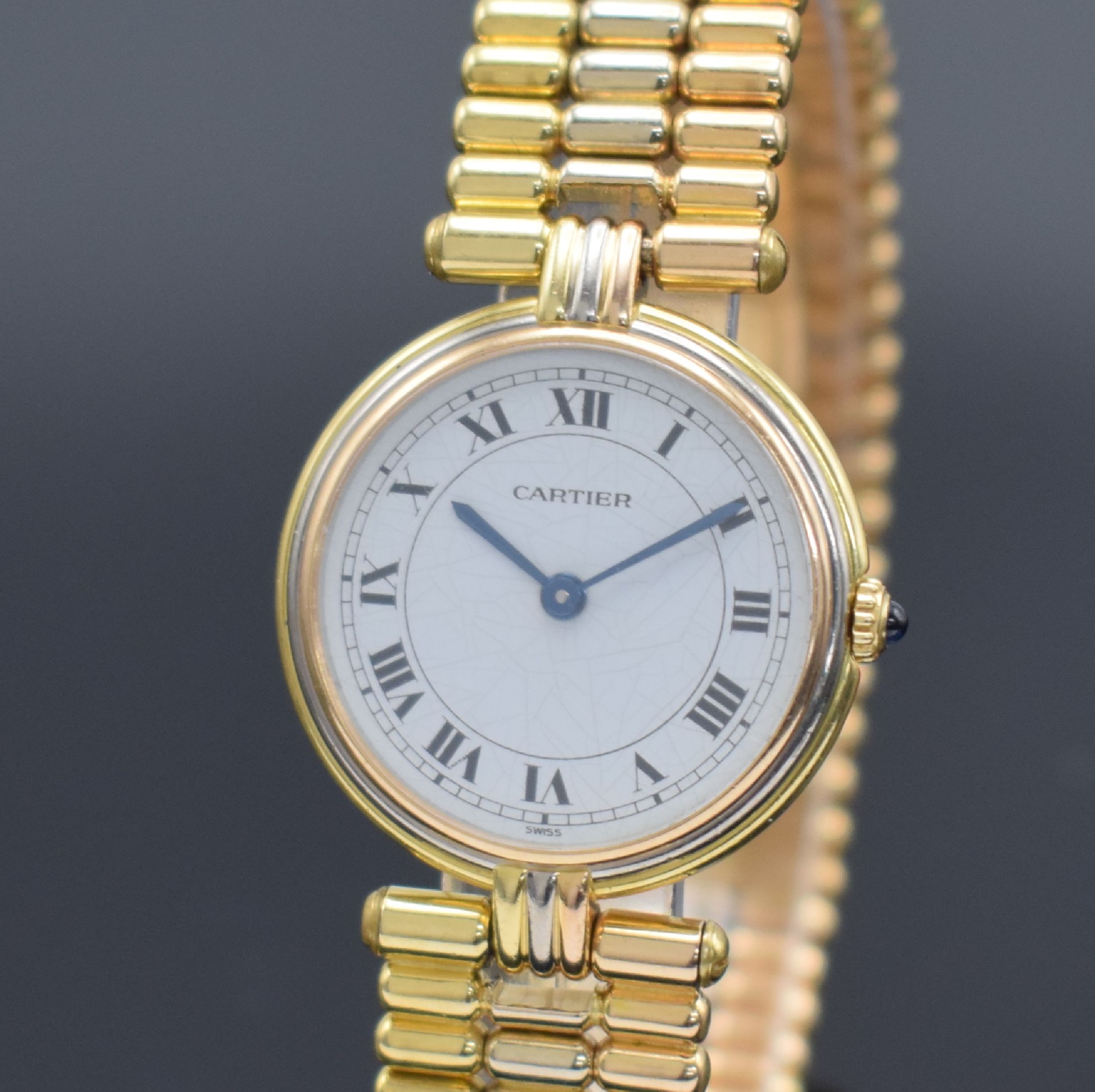Detail a: CARTIER Vendome Trinity Damengoldbanduhr in GG/WG/RG 750/000, Schweiz um 1990, quarz, 2 -fach verschr. Geh., Lünette & Anstöße 3 farbig & 3-fach ...