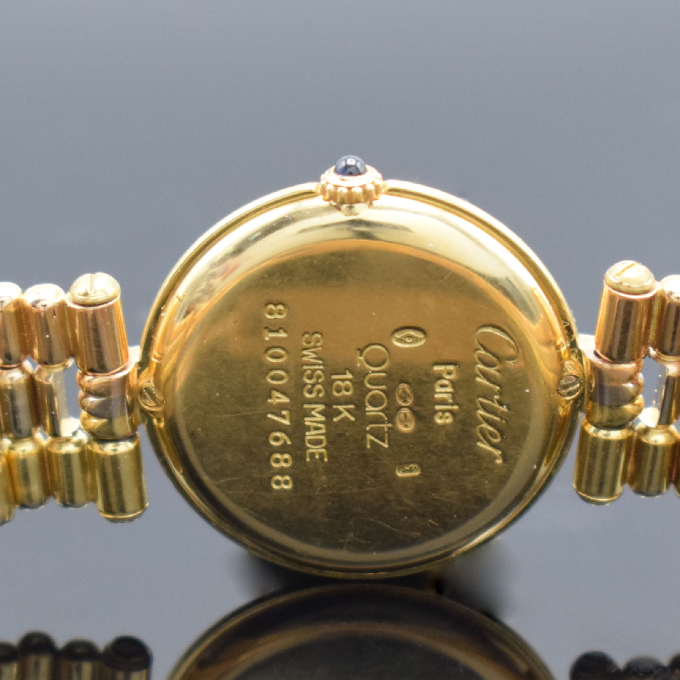 Detail d: CARTIER Vendome Trinity Damengoldbanduhr in GG/WG/RG 750/000, Schweiz um 1990, quarz, 2 -fach verschr. Geh., Lünette & Anstöße 3 farbig & 3-fach ...