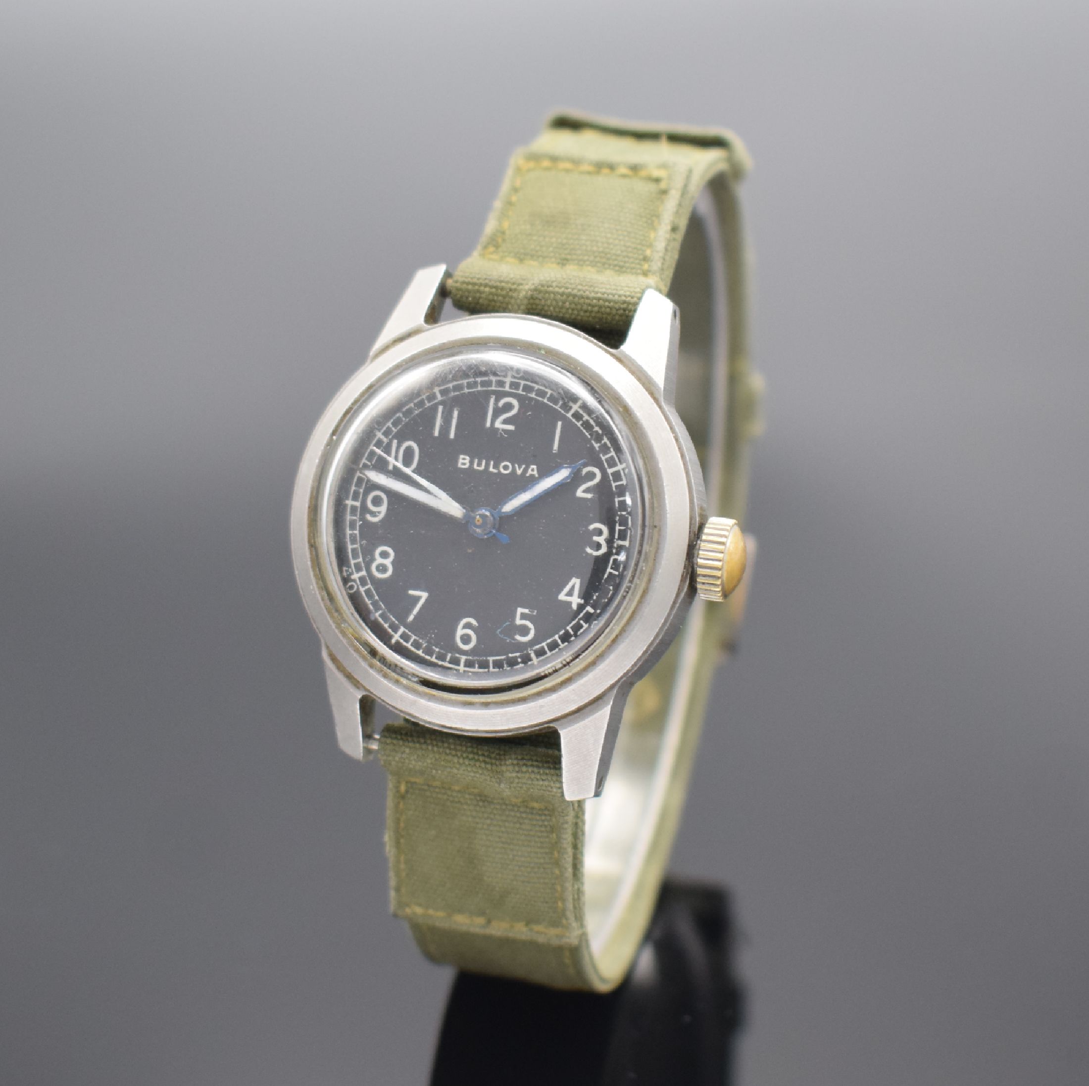 BULOVA Militärarmbanduhr TYPE A17A, Handaufzug, USA um 1950, matt. Edelstahlgeh., Boden verschr., schwarzes Zifferbl. m. arab. Std. ersetzt, gebl. ...