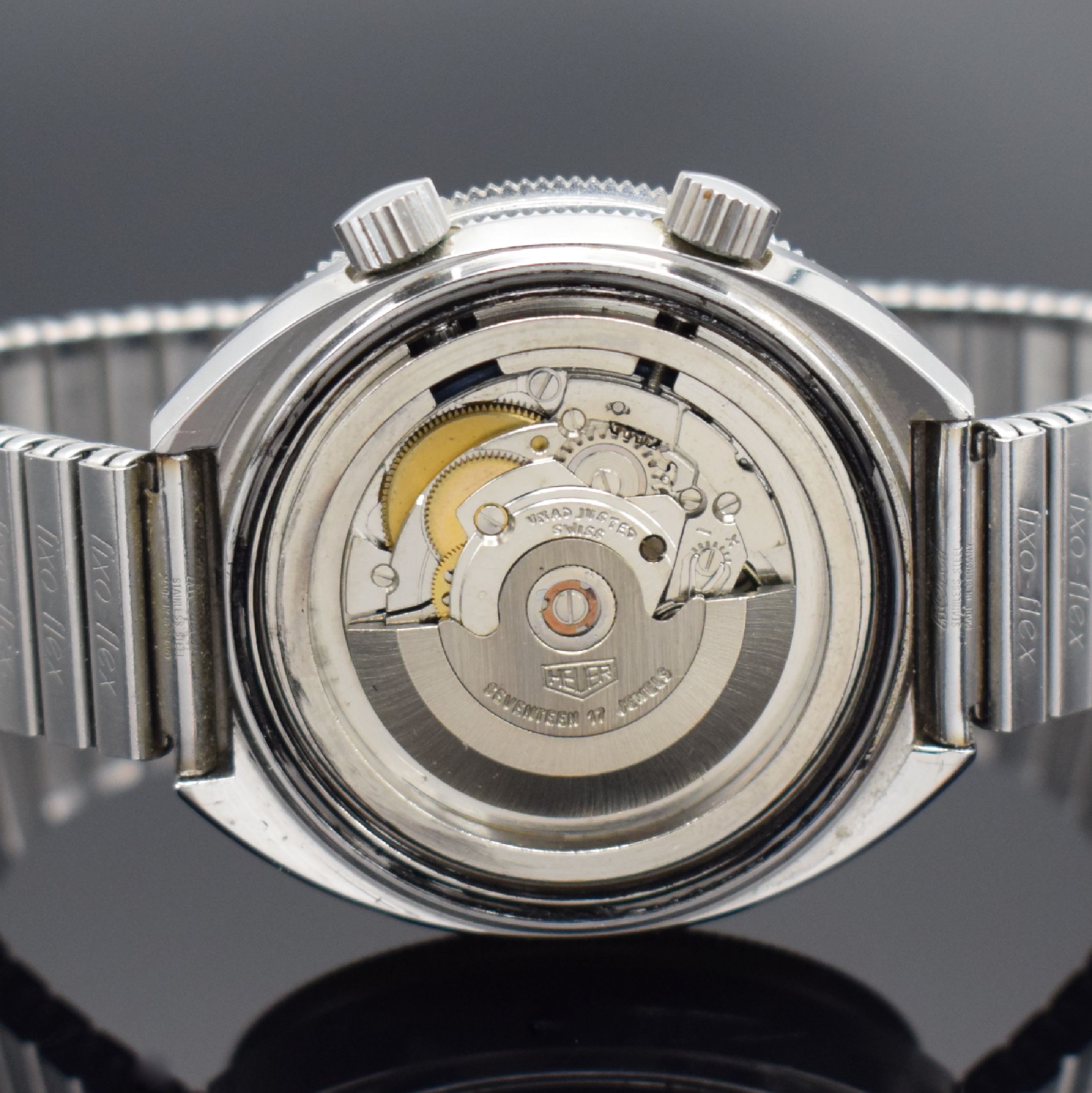 Detail d: HEUER seltene Herrenarmbanduhr mit Tidenanzeige Modell Solunar Referenz 279.603, Schweiz um 1977, Automatik, Edelstahlgeh. inkl. Flexband, Boden ...