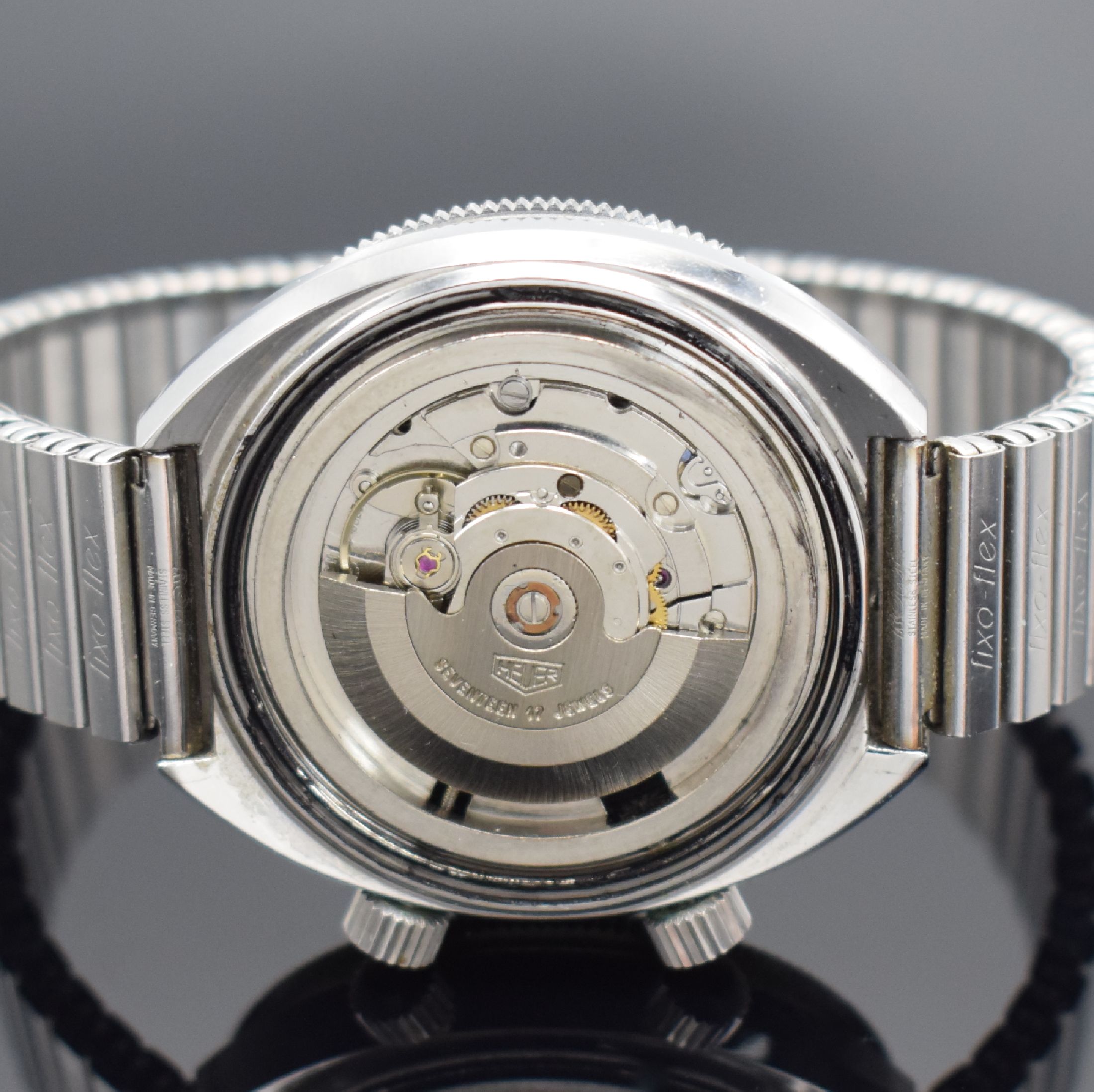 Detail e: HEUER seltene Herrenarmbanduhr mit Tidenanzeige Modell Solunar Referenz 279.603, Schweiz um 1977, Automatik, Edelstahlgeh. inkl. Flexband, Boden ...