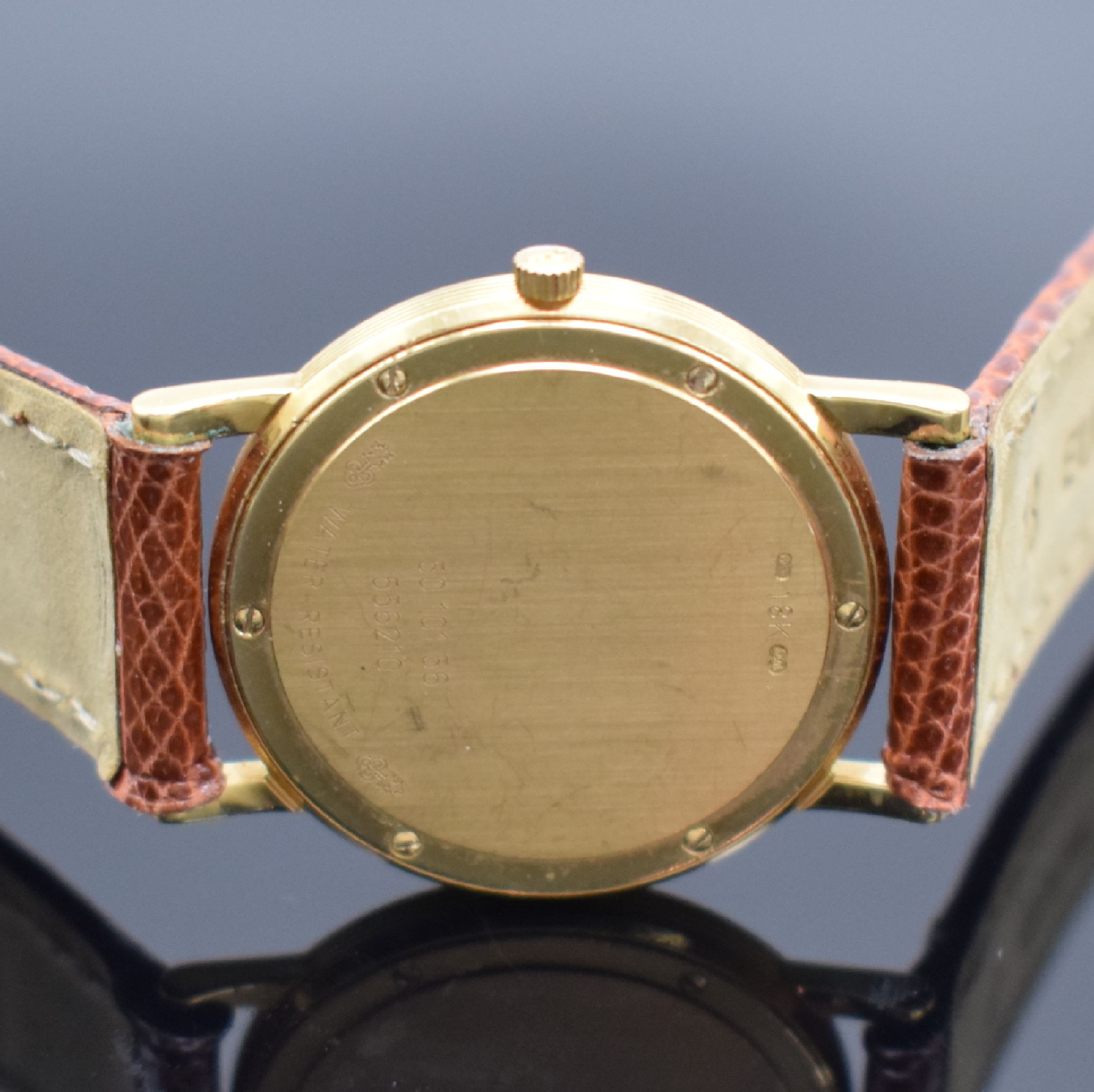 Detail c: CORUM Armbanduhr Romulus in GG 750/000 Referenz 50.101.56, quarz, Boden 6-fach verschr., Lünette m. röm. grav. Zahlen, gold. Zifferbl., gold. ...