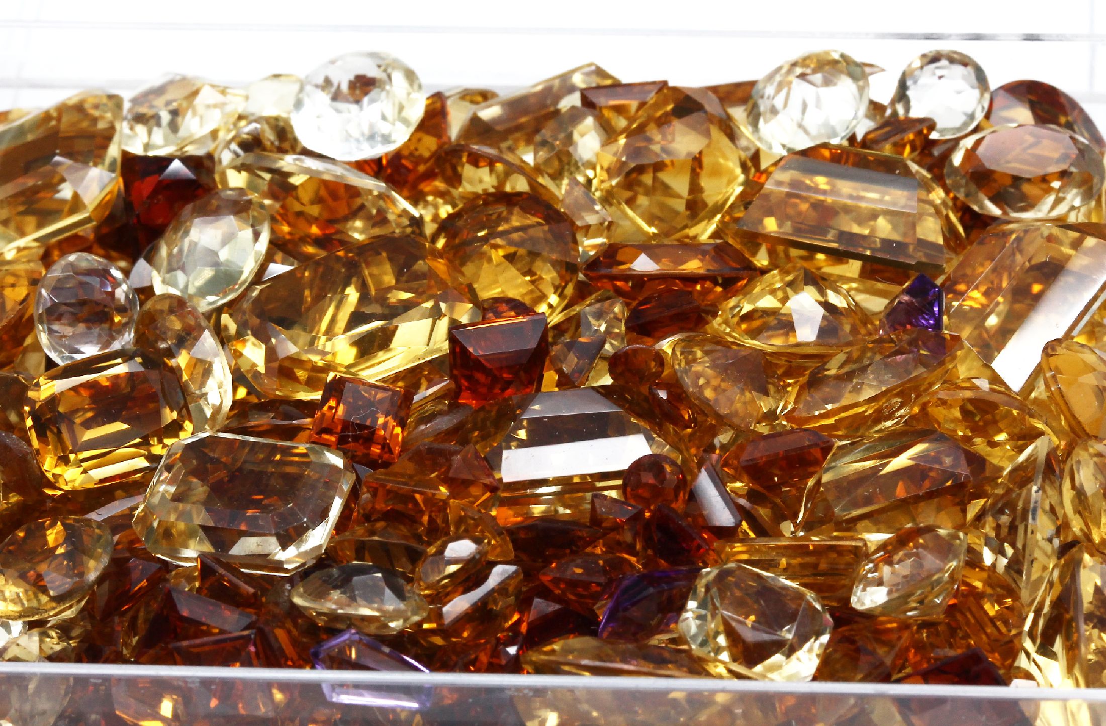 Detail a: Lot lose Citrine zus. ca. 726,00 ct, versch. Größen, Schliffformen und Farbintensitäten, Idar-Obersteiner Schleifarbeit