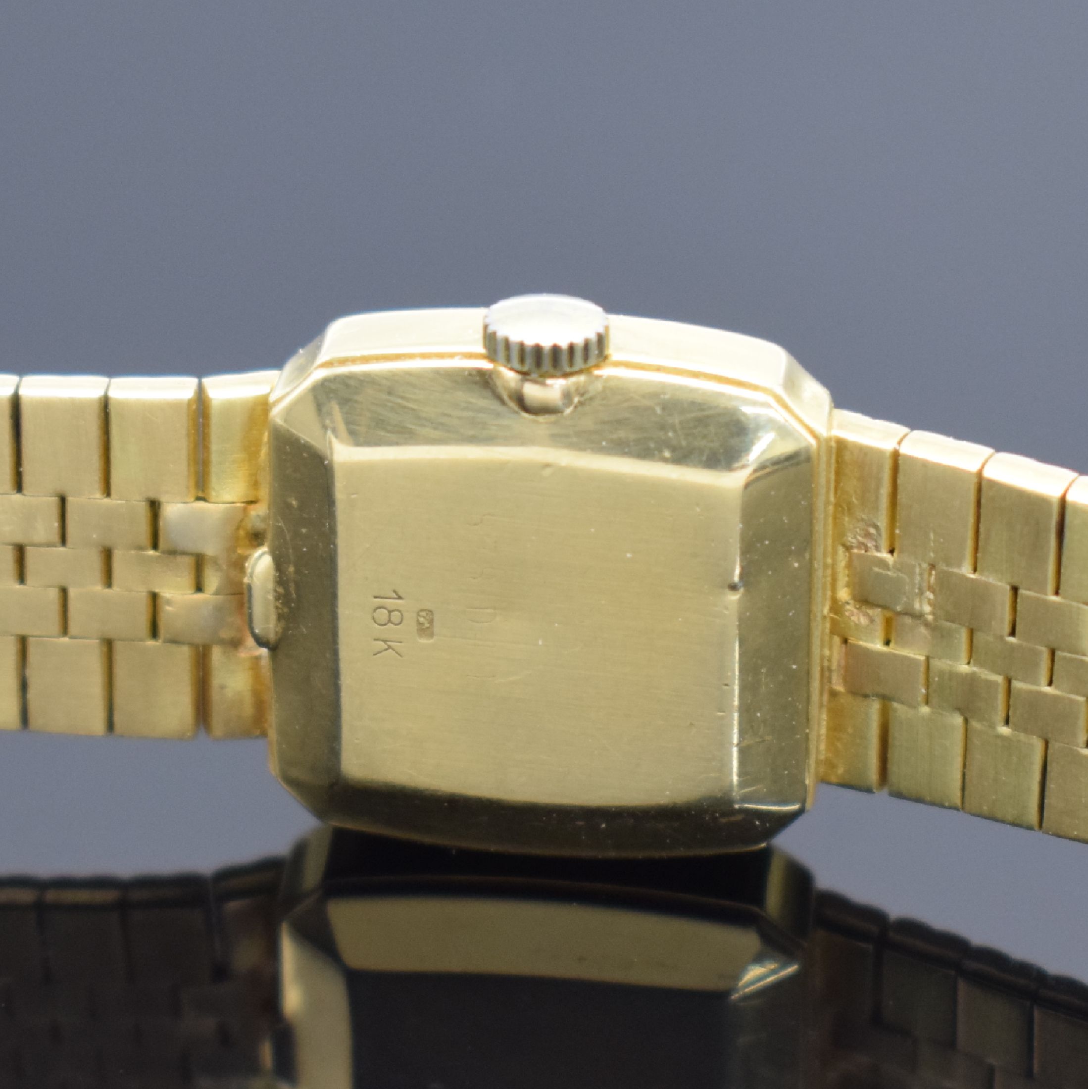 Detail e: EBEL Damengoldbanduhr in GG 750/000, Schweiz verk. lt. beil. orig. Garantie 08/1982, Handaufzug, Geh. an orig. Goldband in GG 750/000, dell. Boden ...