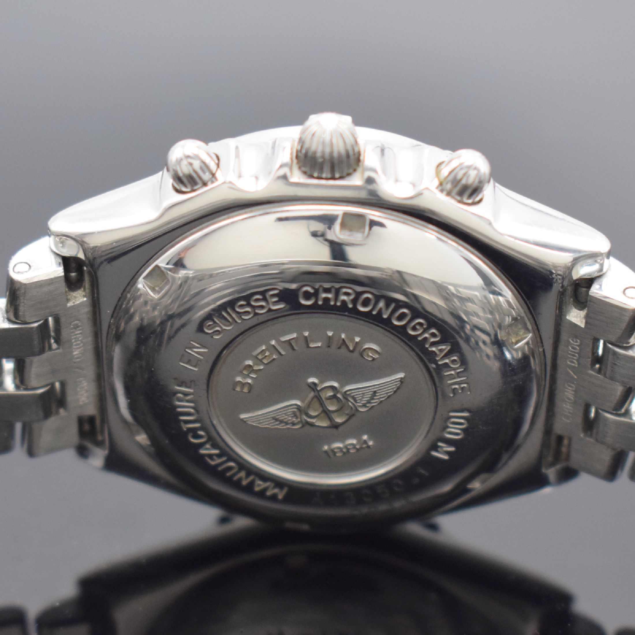 Detail d: BREITLING Chronomat Herrenarmbanduhr mit Chronograph in Stahl, Schweiz um 1995, Automatik, Ref. A13050.1, Boden & Krone verschr., orig. Pilotband m. ...