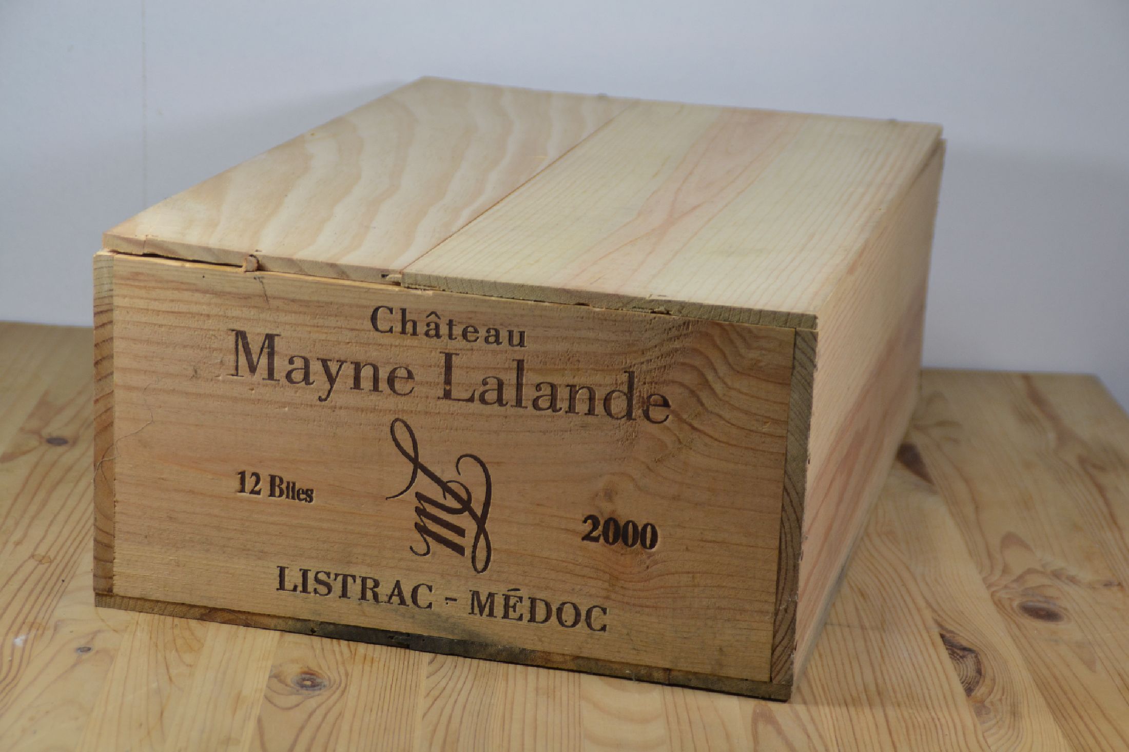12 Flaschen Chateau Mayne Lalande 2000, in orig. verschlossener Holzkiste