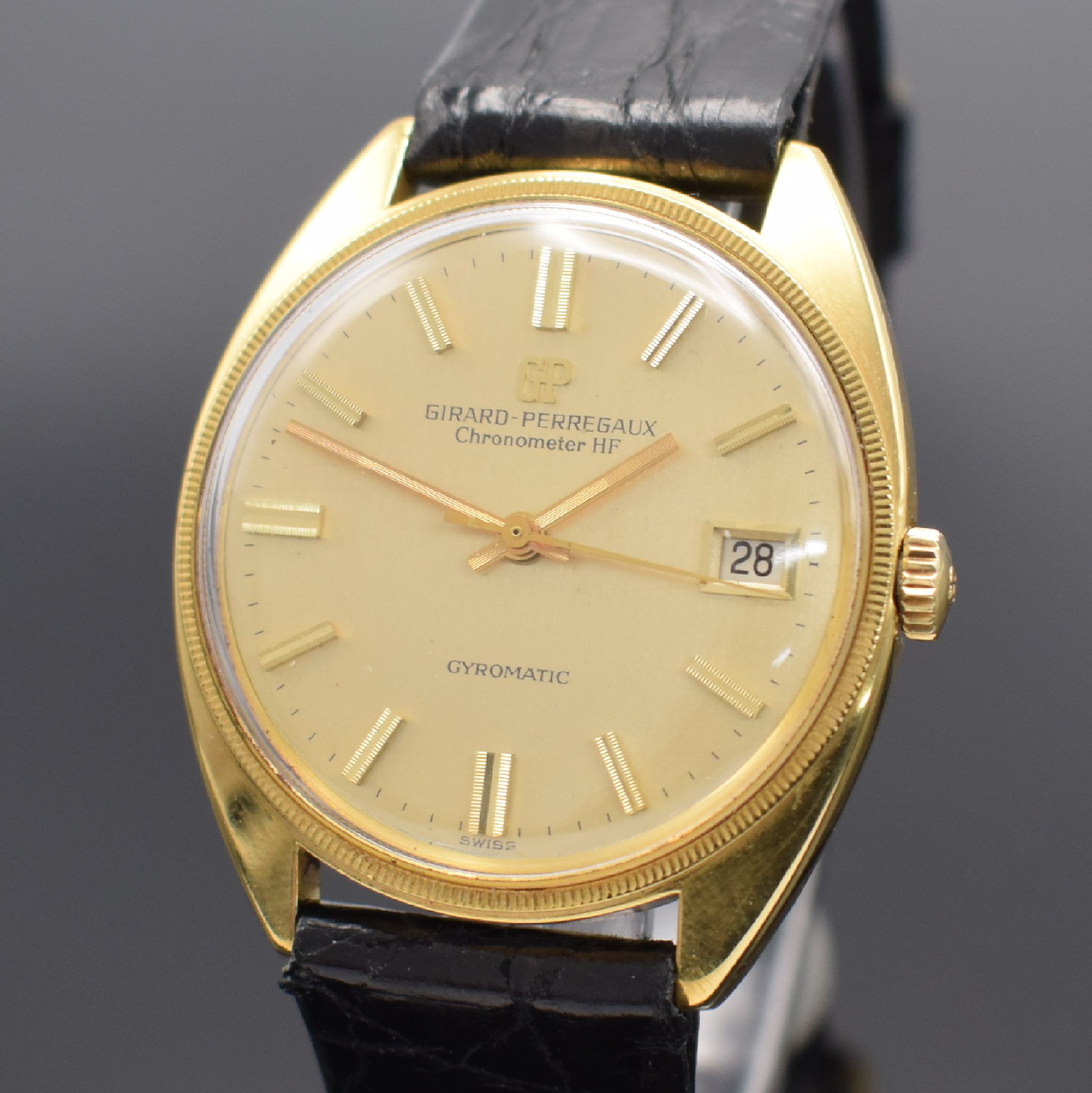 Detail a: GIRARD PERREGAUX Gyromatic Chronometer HF 36000 A/H Herrenarmbanduhr in GG 750/000, Schweiz um 1968, Automatik, Boden verschr., gold. Zifferbl. m. ...