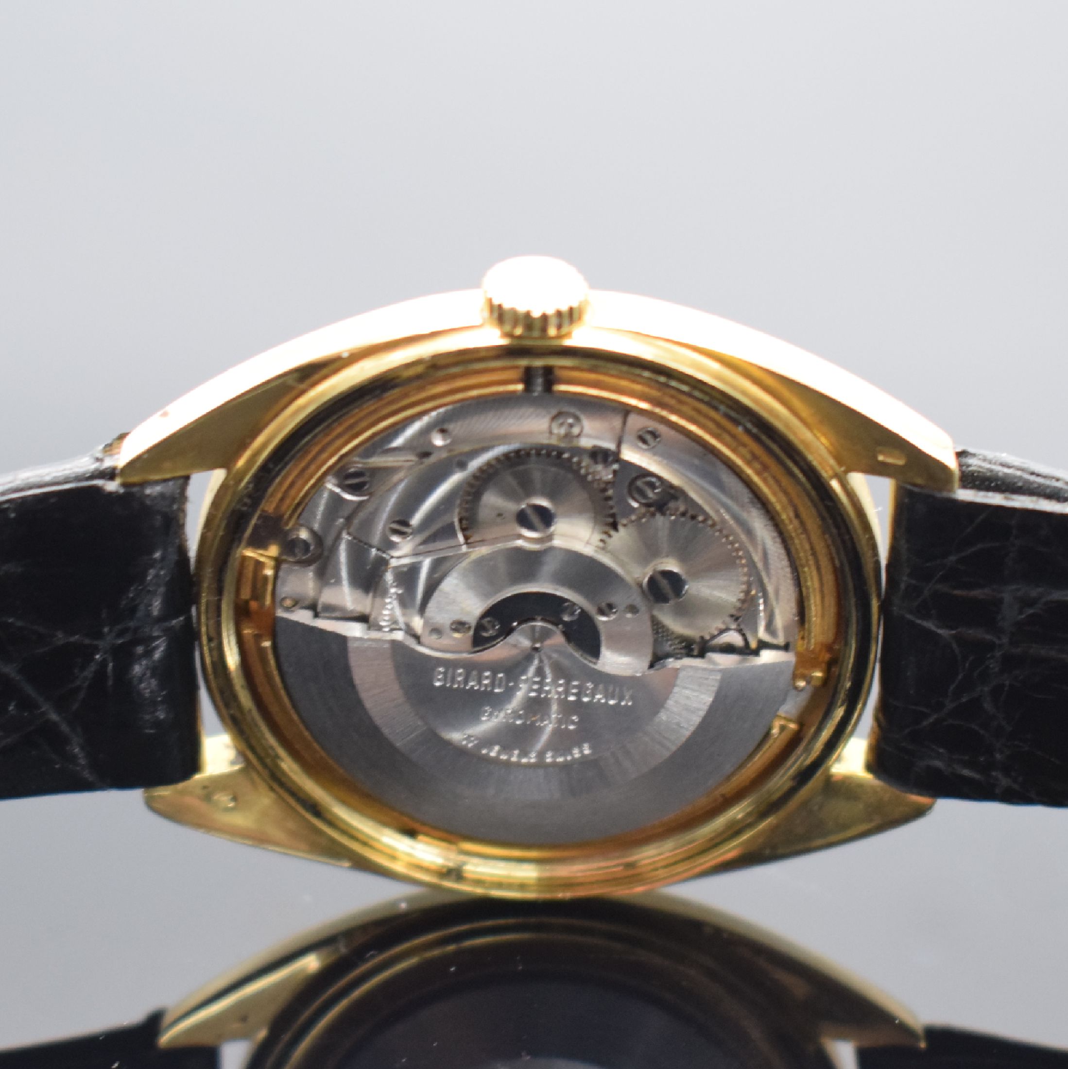Detail d: GIRARD PERREGAUX Gyromatic Chronometer HF 36000 A/H Herrenarmbanduhr in GG 750/000, Schweiz um 1968, Automatik, Boden verschr., gold. Zifferbl. m. ...