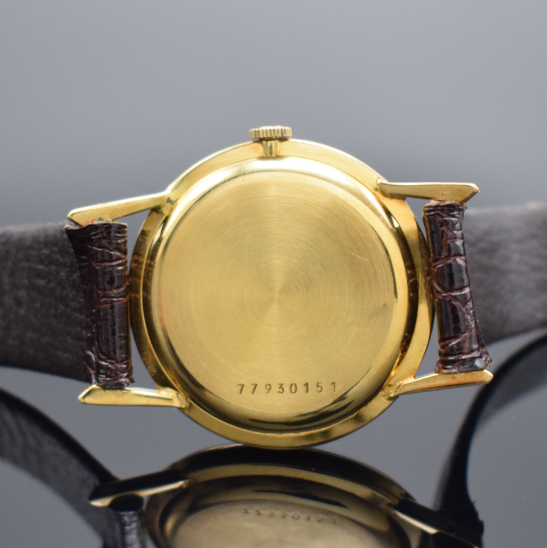 Detail d: GIRARD PERREGAUX Herrenarmbanduhr in GG 750/000, Schweiz um 1965, Handaufzug, Boden aufgedr., silb. Zifferbl. m. gold. Std.-Ind. & Zeigern rest., ...