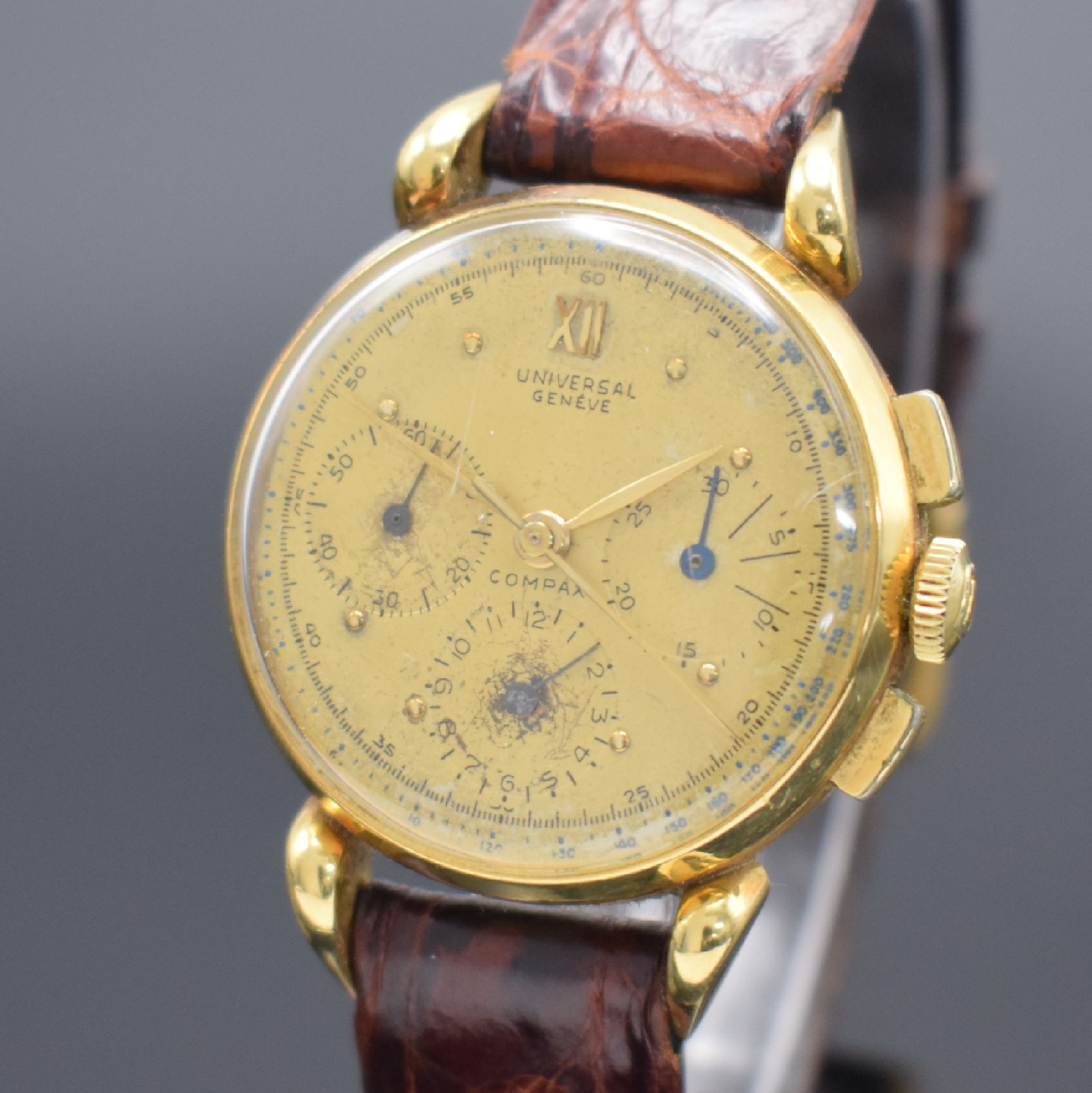 Detail a: UNIVERSAL GENEVE Compax Schaltradchronograph in GG 750/000, Schweiz um 1945, Handaufzug, dell. Geh. teils angel., Boden & Glasrand aufgedr., ...