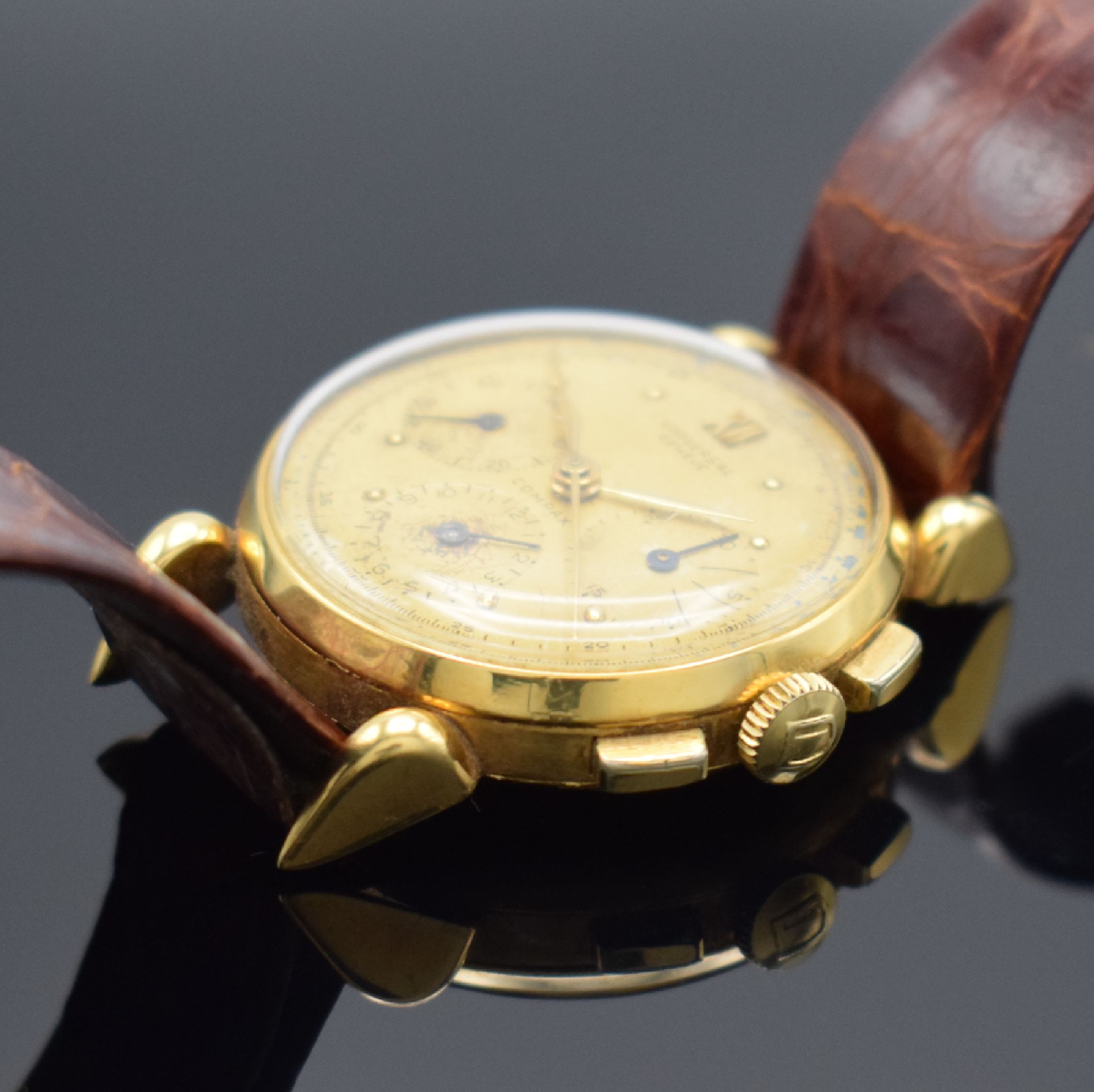 Detail b: UNIVERSAL GENEVE Compax Schaltradchronograph in GG 750/000, Schweiz um 1945, Handaufzug, dell. Geh. teils angel., Boden & Glasrand aufgedr., ...