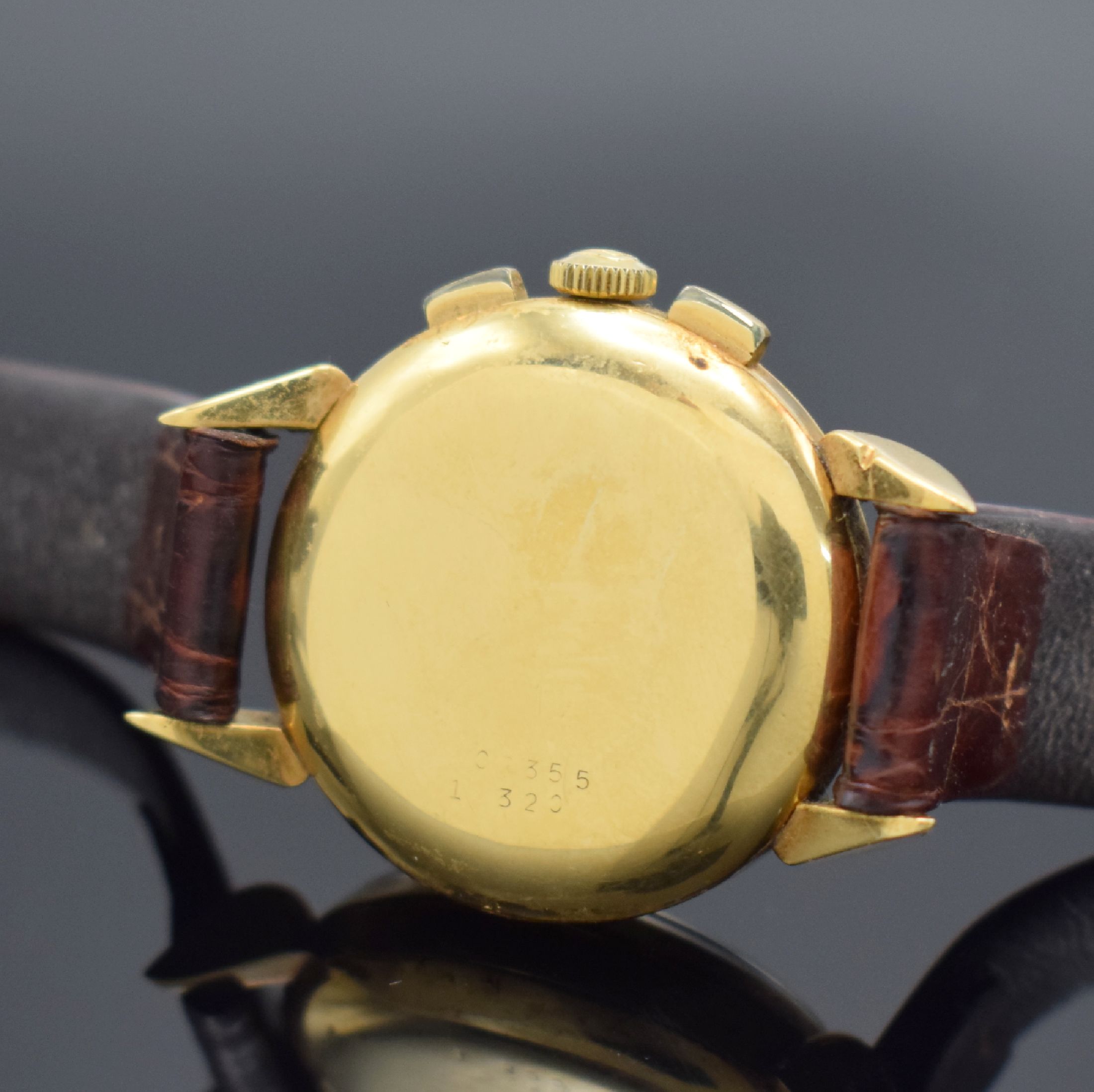 Detail c: UNIVERSAL GENEVE Compax Schaltradchronograph in GG 750/000, Schweiz um 1945, Handaufzug, dell. Geh. teils angel., Boden & Glasrand aufgedr., ...