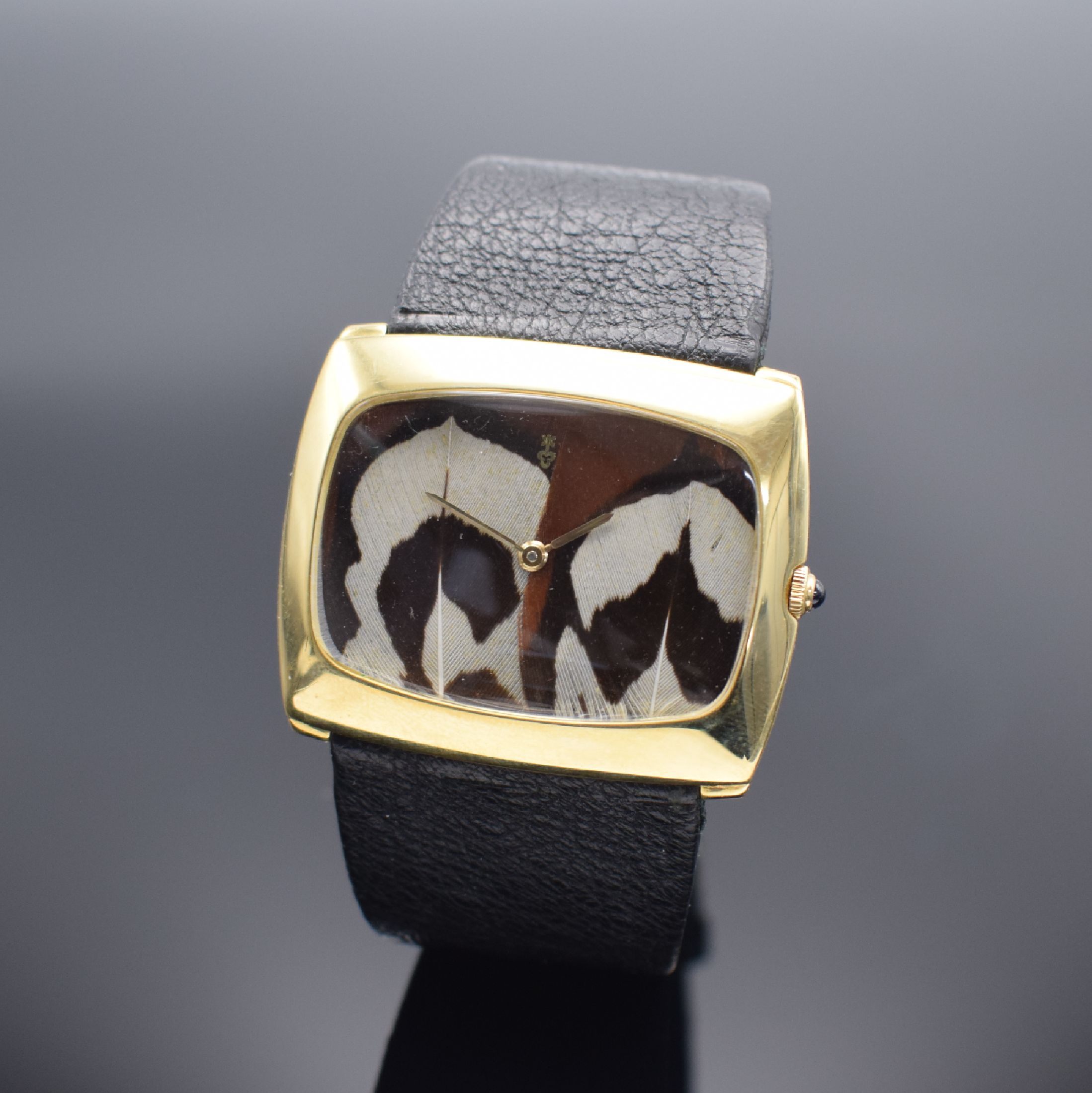 CORUM sehr seltene, große Armbanduhr mit Vogelfeder-Zifferblatt in GG 750/000 Referenz 57183, Handaufzug, Schweiz um 1975, orig. Lederband m. verg. ...
