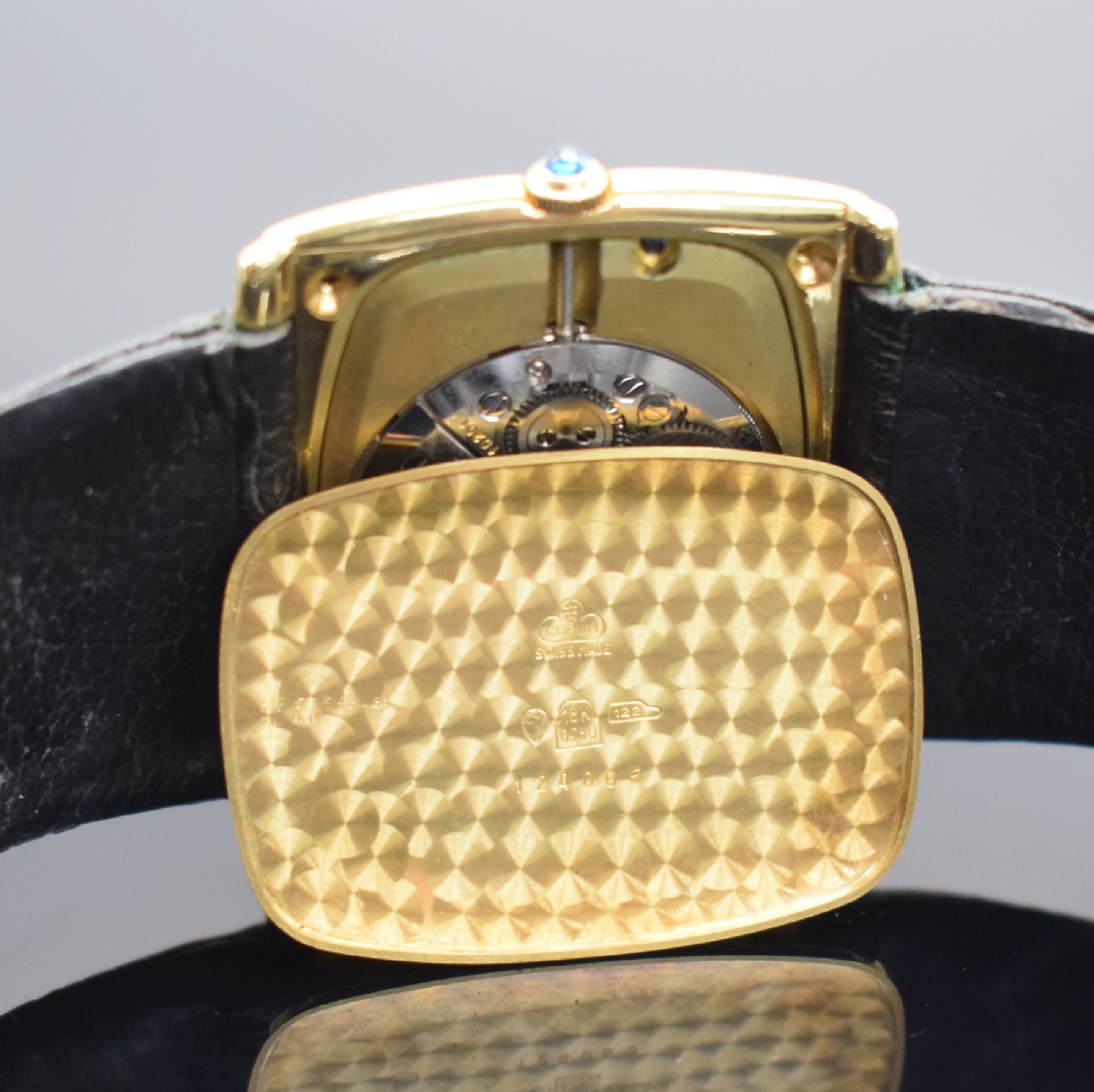 Detail e: CORUM sehr seltene, große Armbanduhr mit Vogelfeder-Zifferblatt in GG 750/000 Referenz 57183, Handaufzug, Schweiz um 1975, orig. Lederband m. verg. ...