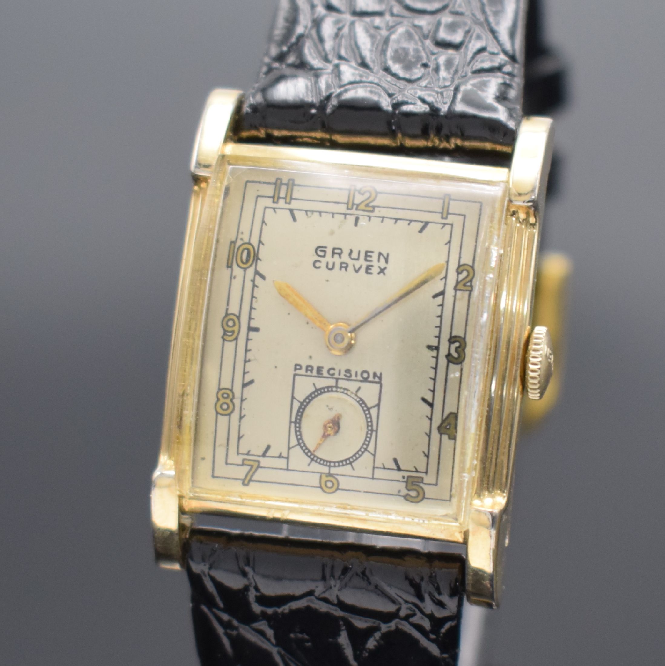 Detail a: GRUEN Curvex Herrenarmbanduhr, Schweiz/USA um 1941, Handaufzug, Ref. 440 575, gewölbtes Geh. in 10K gold filled, Boden aufgedr., gewölbtes ...