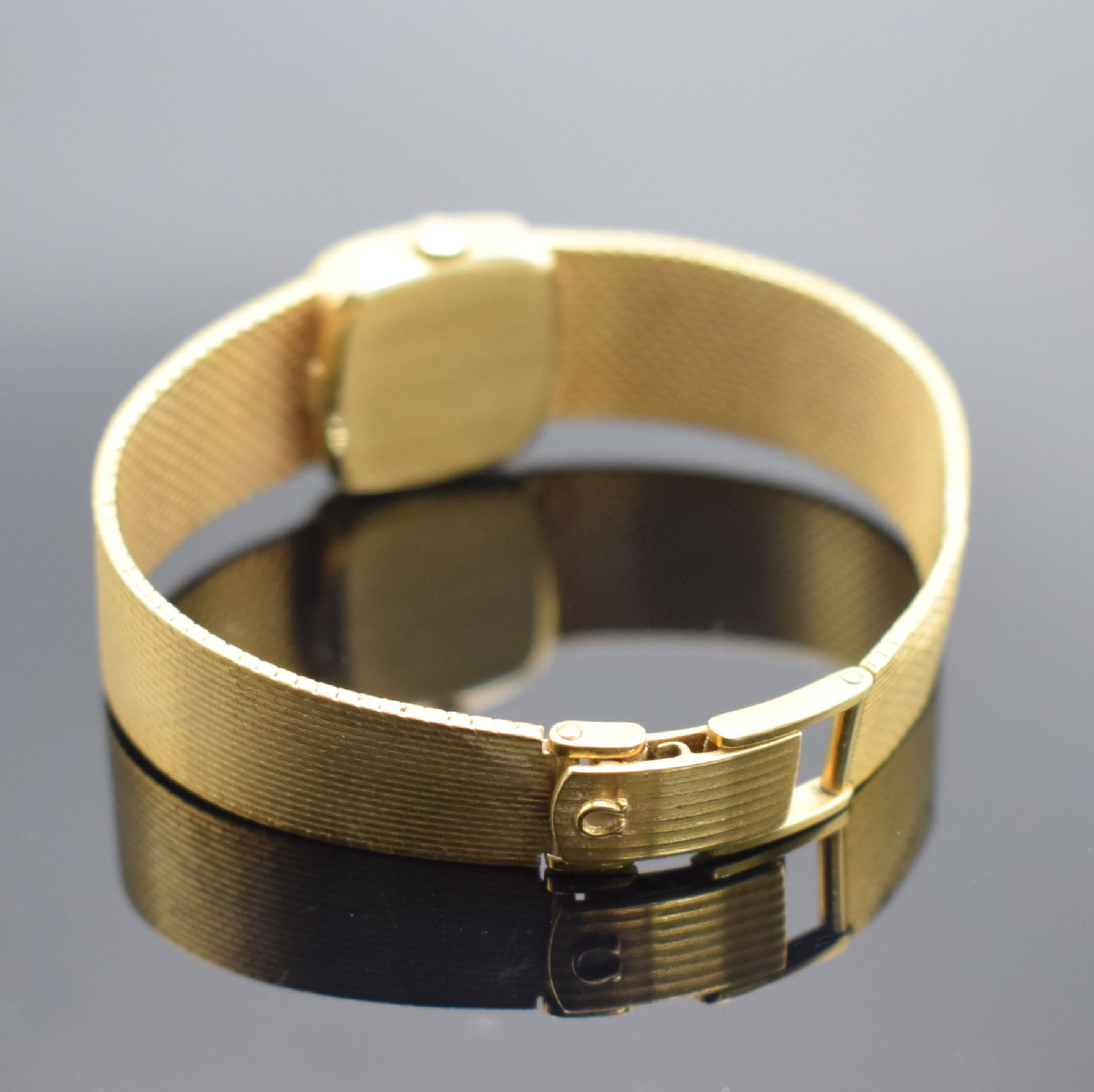 Detail b: OMEGA De Ville Damenarmbanduhr in GG 750/000, Handaufzug, Schweiz um 1972, 2- teil. Gehäuse, Boden aufgedr., orig. Milanaiseband, gold. ...