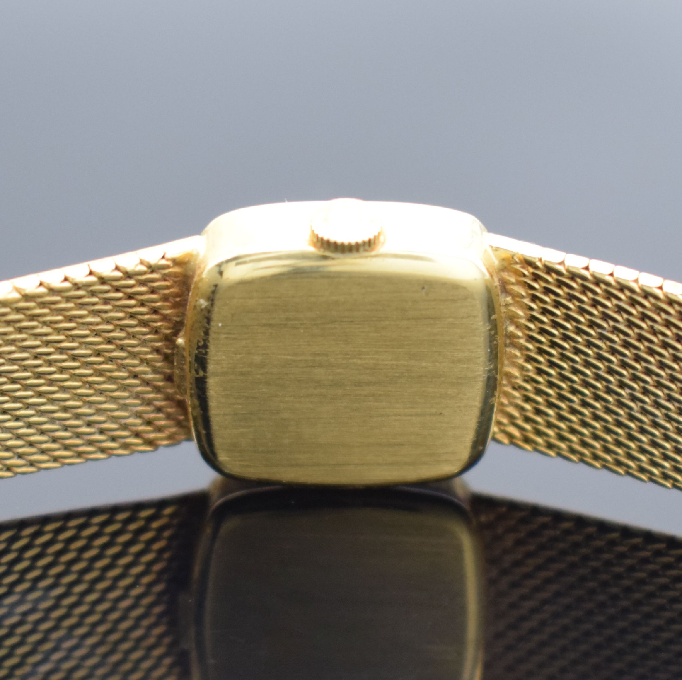 Detail e: OMEGA De Ville Damenarmbanduhr in GG 750/000, Handaufzug, Schweiz um 1972, 2- teil. Gehäuse, Boden aufgedr., orig. Milanaiseband, gold. ...