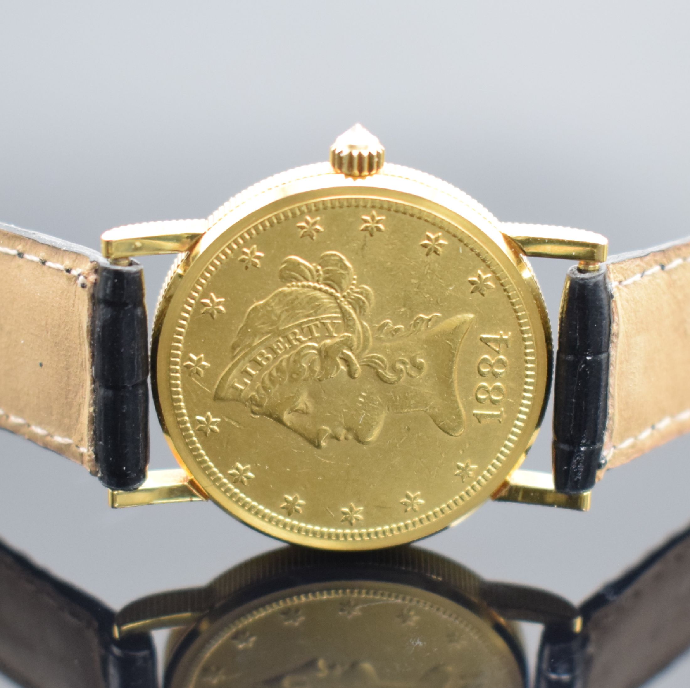 Detail d: CORUM Herrenarmbanduhr in Form einer 10 US- Dollar Goldmünze von 1884, Handaufzug, Schweiz um 1976, massiv GG 750/000 inkl. Lederband m. orig. ...