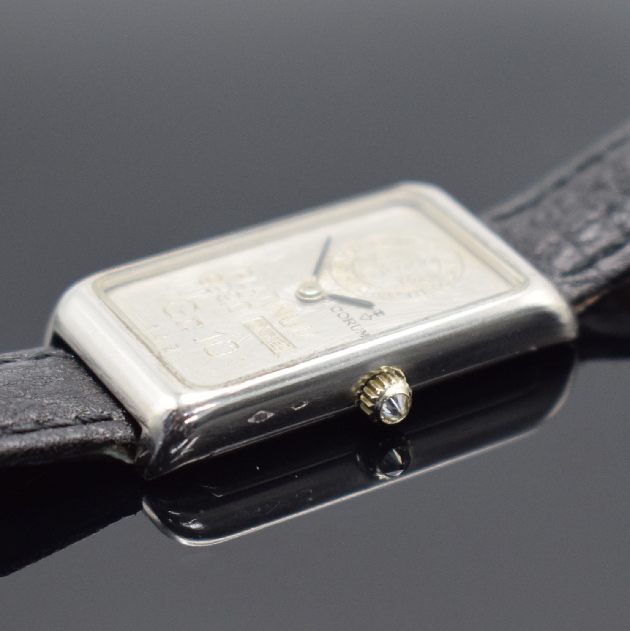 Detail c: CORUM hochfeine & seltene Herrenarmbanduhr in Form eines 10g Platinbarrens Nr. 142, Handaufzug, Schweiz um 1979, Platingeh. inkl. Lederband m. orig. ...