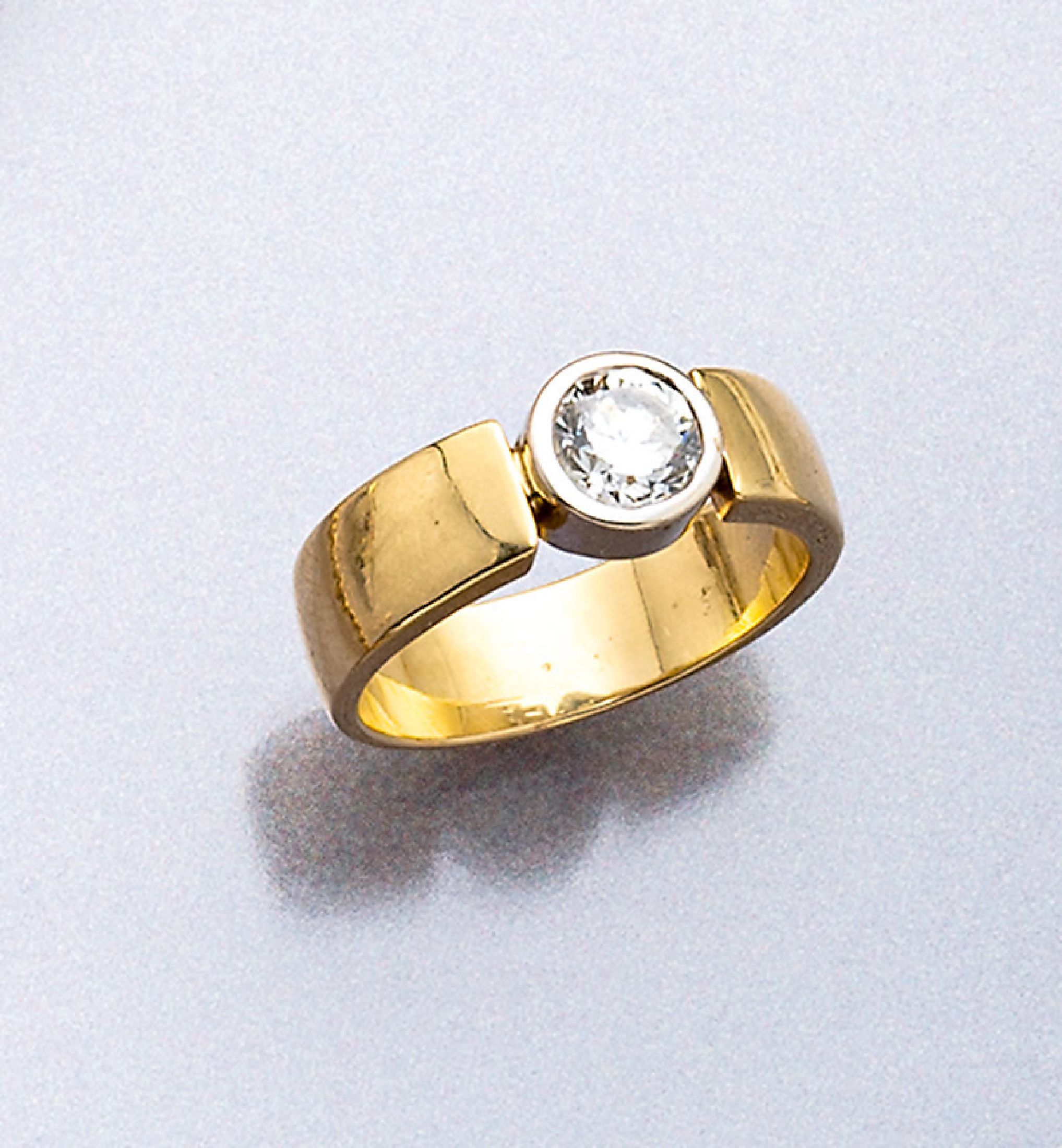 18 kt Gold Brillant-Ring, GG/WG 750/000, einzelner in WG gefasster Brillant ca. 1.05 ctl.get.Weiß/vs, RW 58, ca. 9.6 g