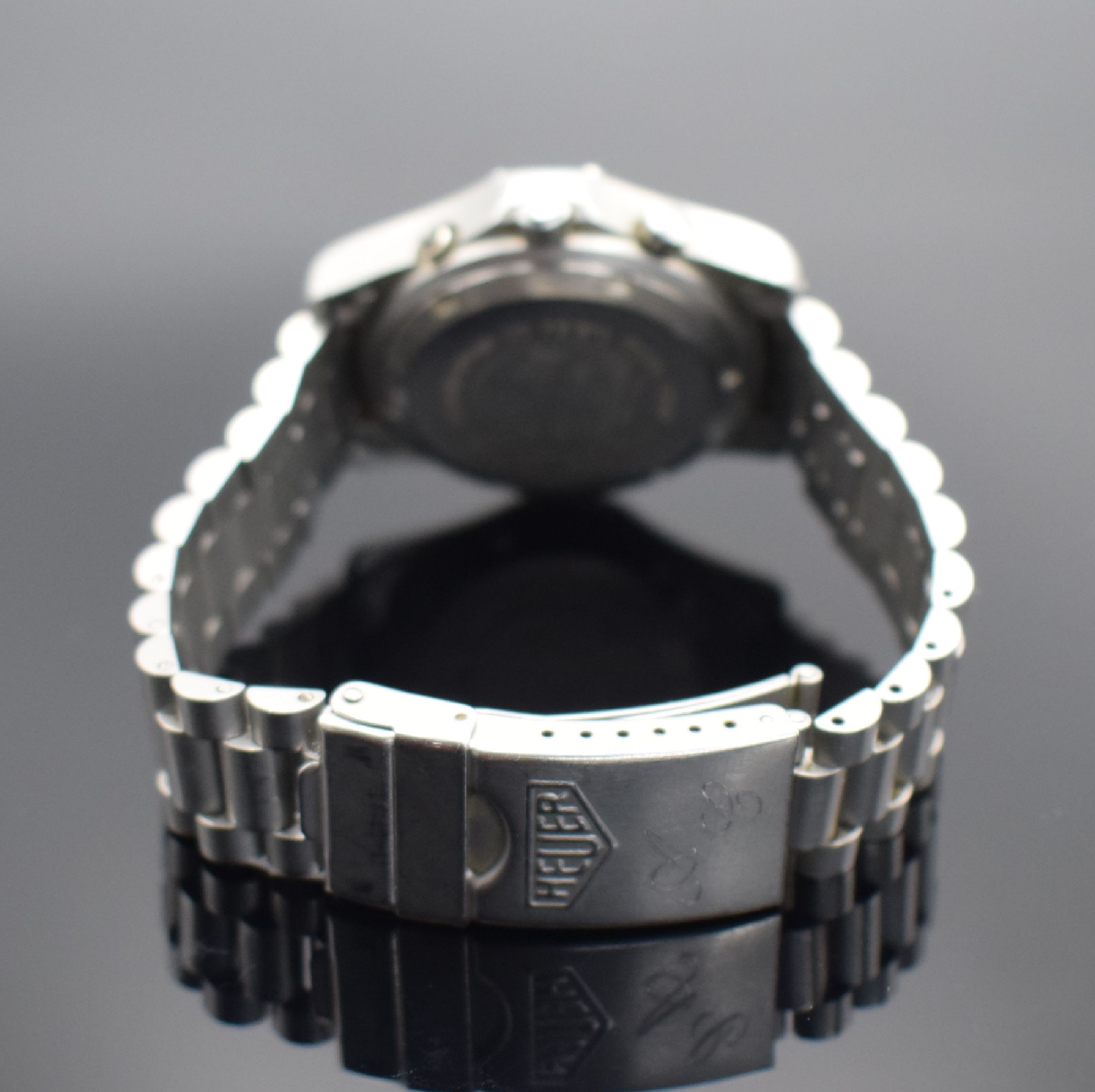 Detail b: HEUER 2000 Herrenarmbanduhr mit Chronograph, Schweiz um 1985, quarz, Ref. 250.006-1, verschr. Edelstahlgeh., orig. Gliederband, Faltschl. m. ...
