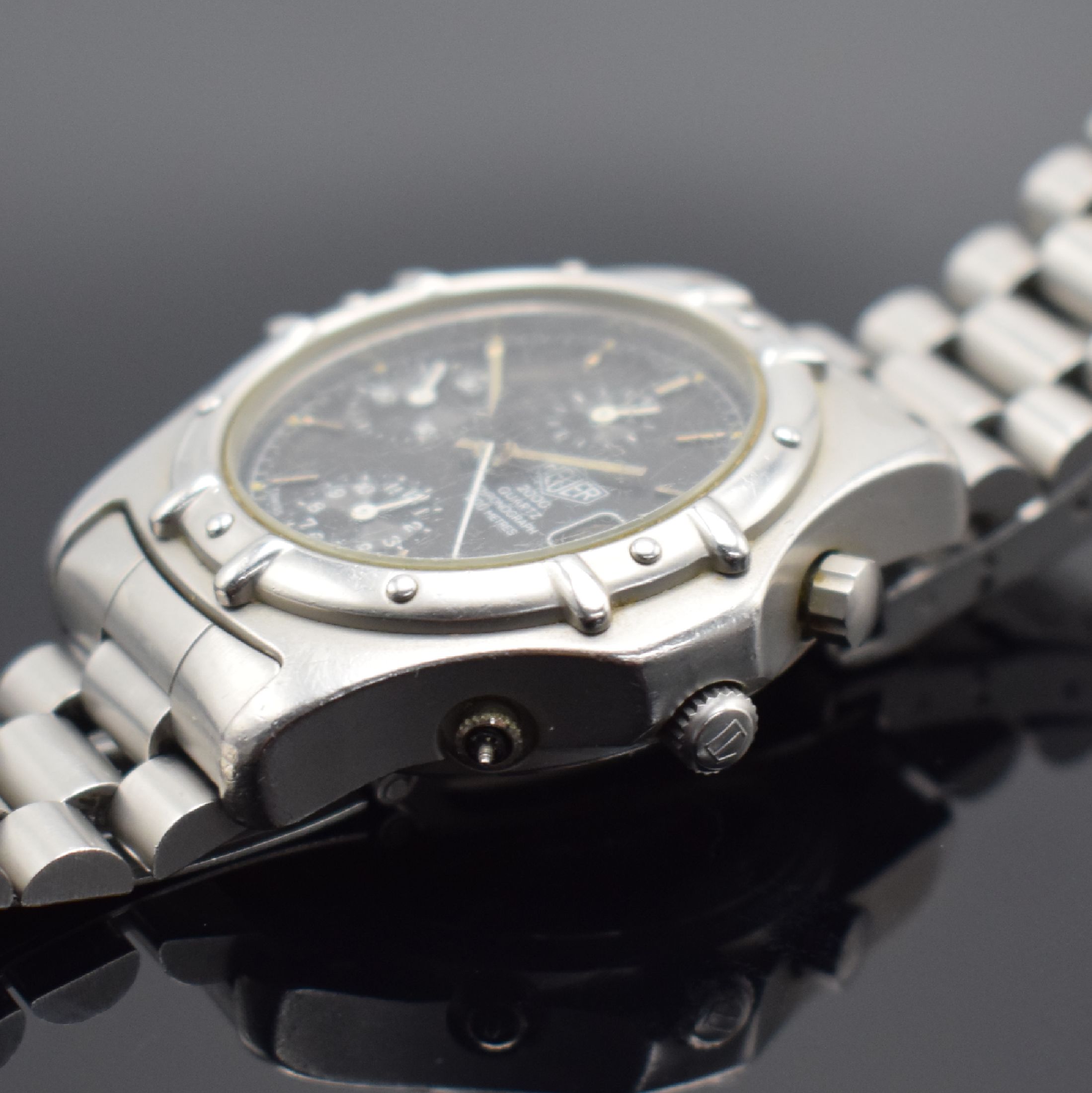 Detail c: HEUER 2000 Herrenarmbanduhr mit Chronograph, Schweiz um 1985, quarz, Ref. 250.006-1, verschr. Edelstahlgeh., orig. Gliederband, Faltschl. m. ...