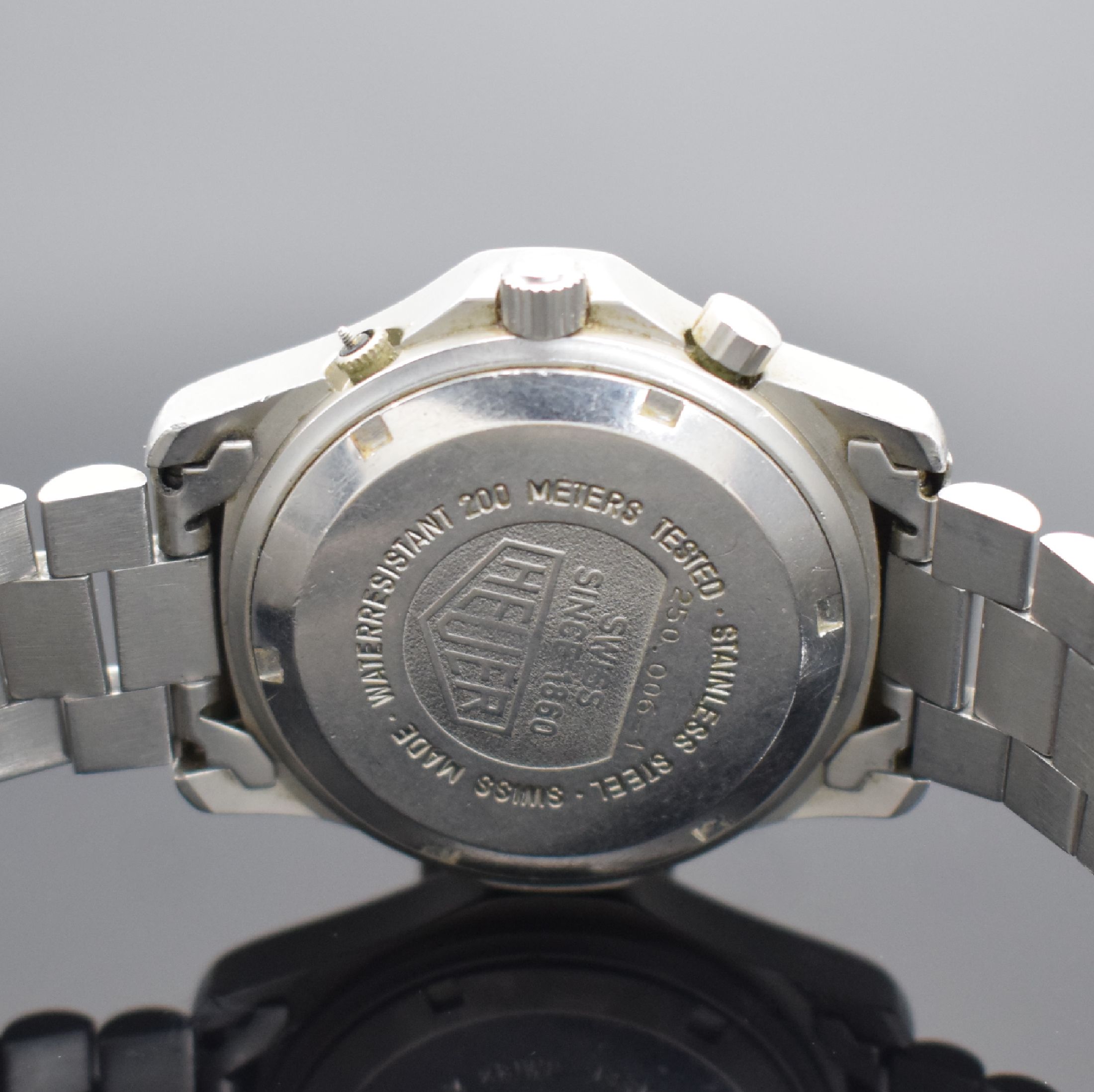 Detail d: HEUER 2000 Herrenarmbanduhr mit Chronograph, Schweiz um 1985, quarz, Ref. 250.006-1, verschr. Edelstahlgeh., orig. Gliederband, Faltschl. m. ...
