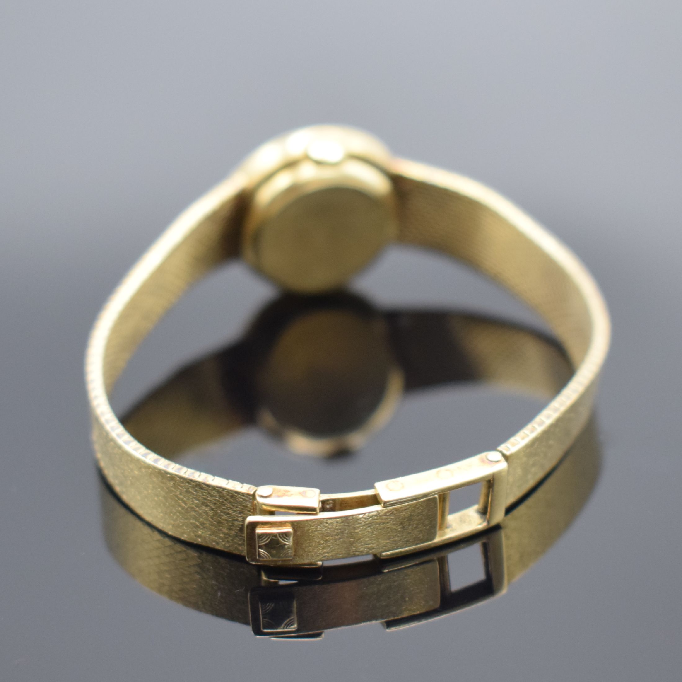 Detail b: ZENITH Damengoldbanduhr in GG 585/000 mit Diamanten, Schweiz um 1980, quarz, Geh. an orig. GG 585/000 Armband, Boden aufgedr., schwarzes Zifferbl. m. ...