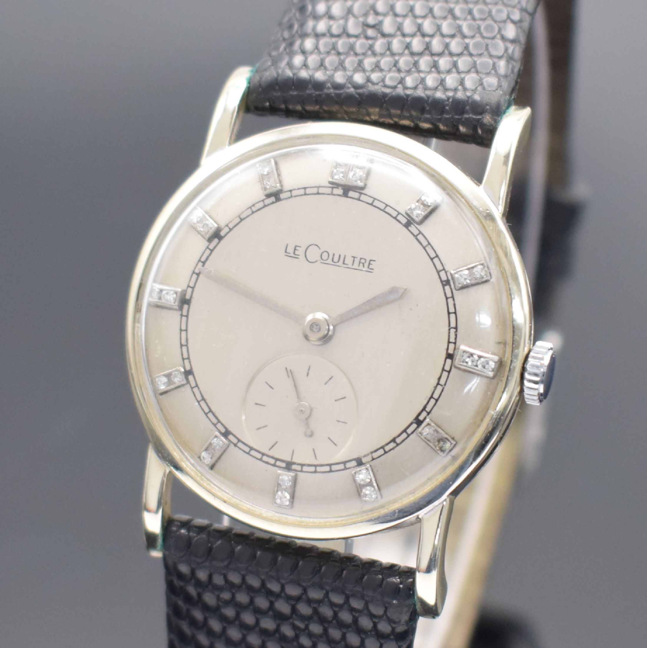Detail a: LeCoultre Armbanduhr in WG 750/000, Schweiz für den US-Markt um 1950, Handaufzug, 2-teil. Geh., Boden aufgedr., silb. rest. Zifferbl., aufges. ...