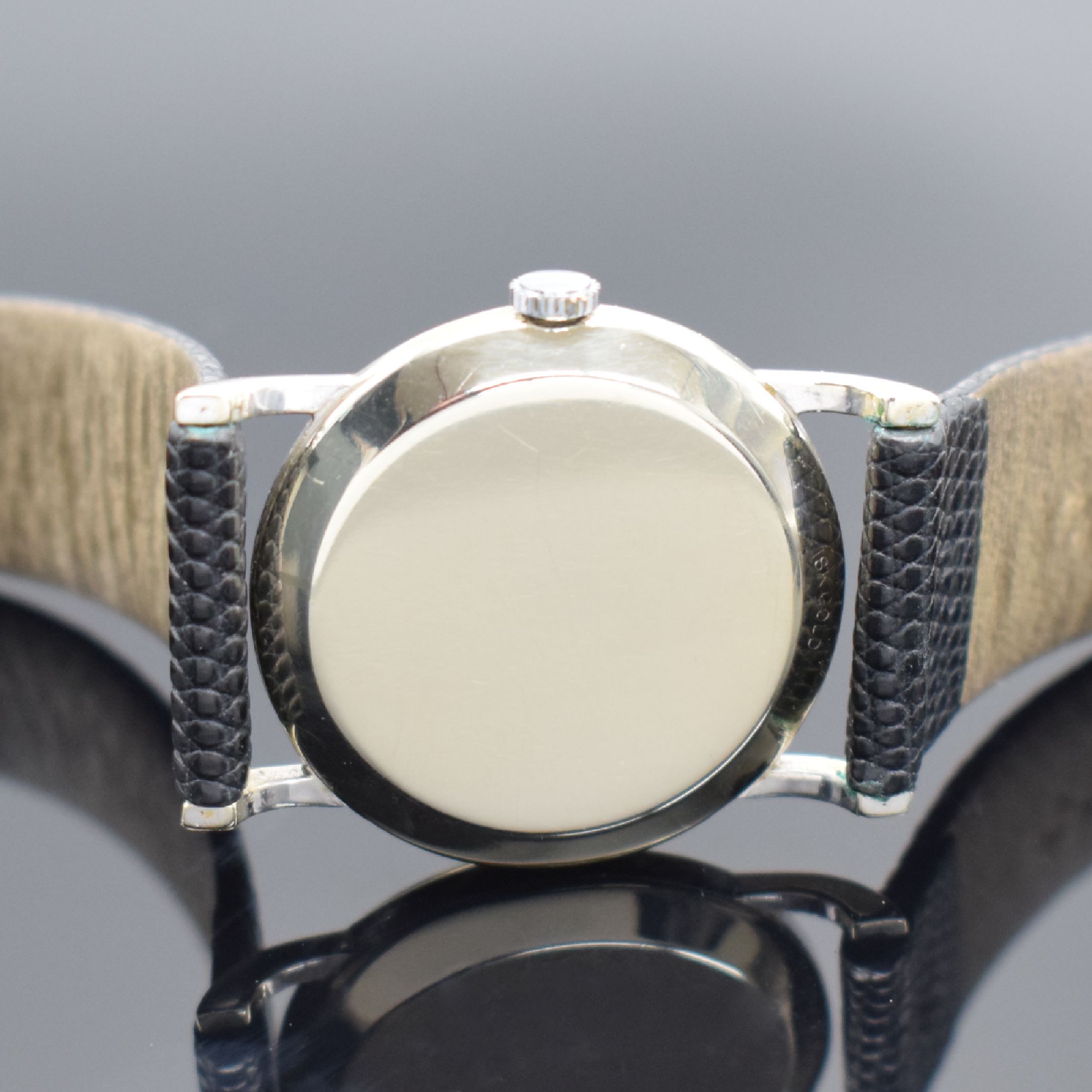 Detail b: LeCoultre Armbanduhr in WG 750/000, Schweiz für den US-Markt um 1950, Handaufzug, 2-teil. Geh., Boden aufgedr., silb. rest. Zifferbl., aufges. ...
