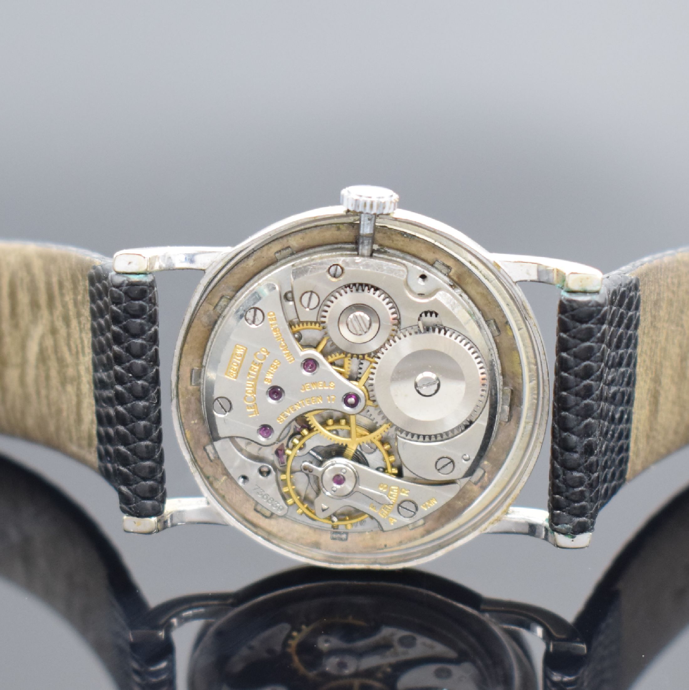 Detail c: LeCoultre Armbanduhr in WG 750/000, Schweiz für den US-Markt um 1950, Handaufzug, 2-teil. Geh., Boden aufgedr., silb. rest. Zifferbl., aufges. ...