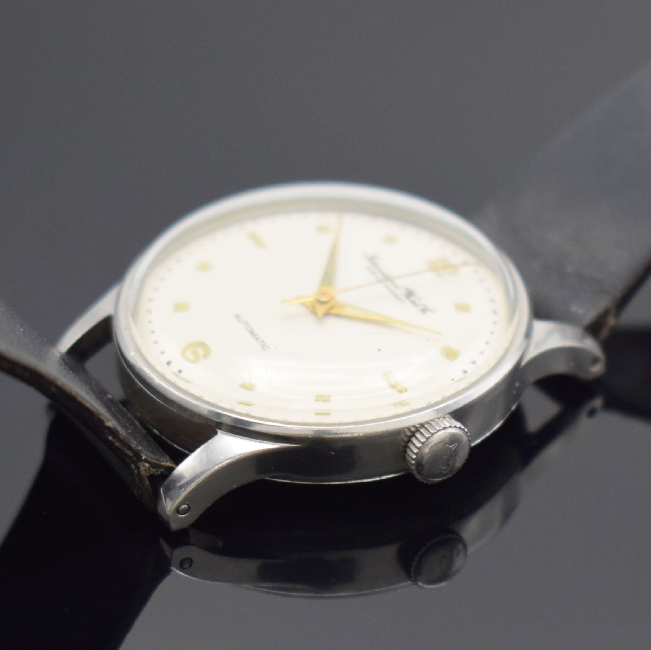 Detail b: IWC Herrenarmbanduhr in Stahl mit Kaliber 85, Schweiz um 1952, Automatik, 2-teil. Gehäuse, Boden aufgedr., silb. rest. Zifferbl. m. aufges. ...