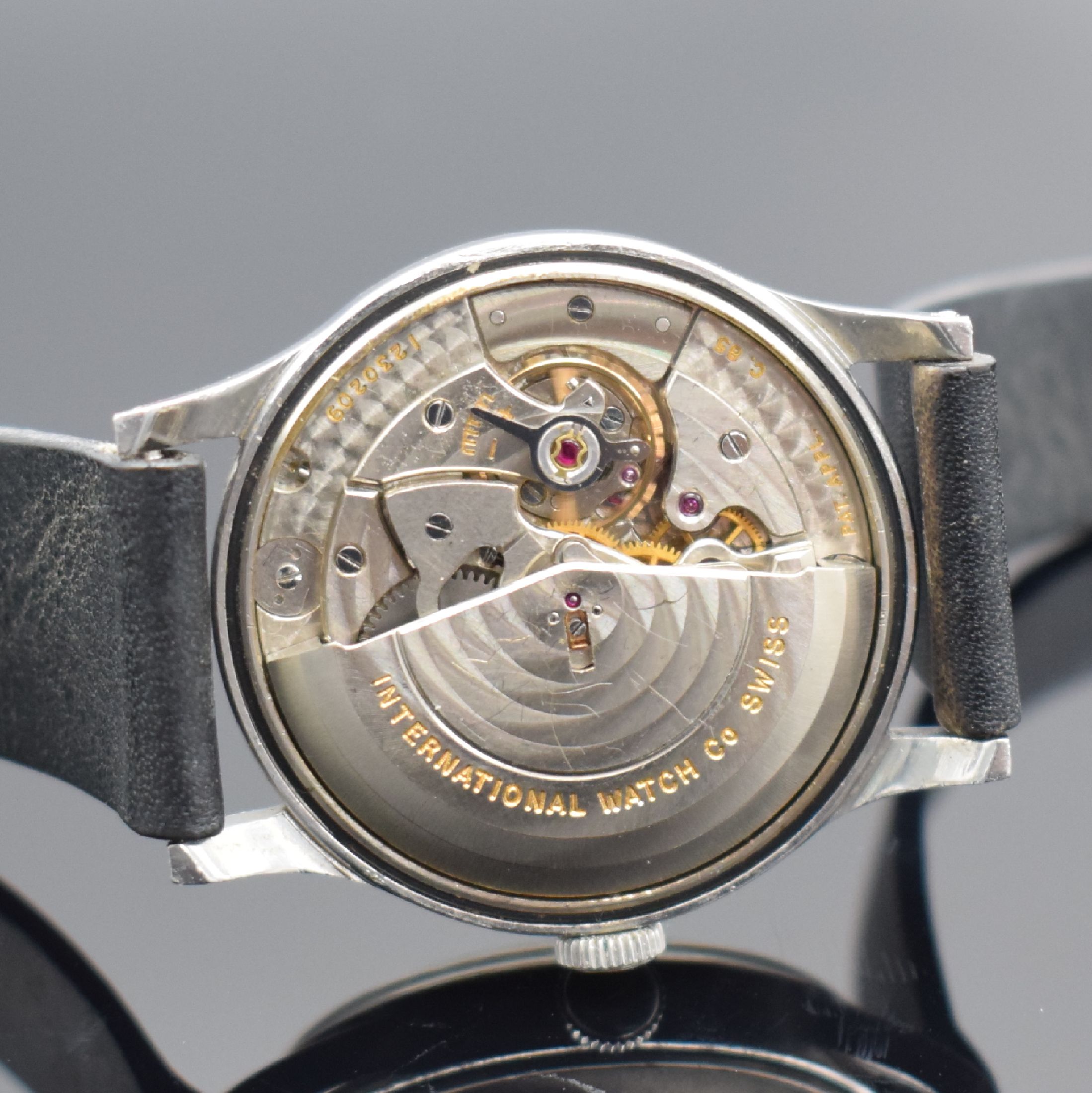 Detail e: IWC Herrenarmbanduhr in Stahl mit Kaliber 85, Schweiz um 1952, Automatik, 2-teil. Gehäuse, Boden aufgedr., silb. rest. Zifferbl. m. aufges. ...