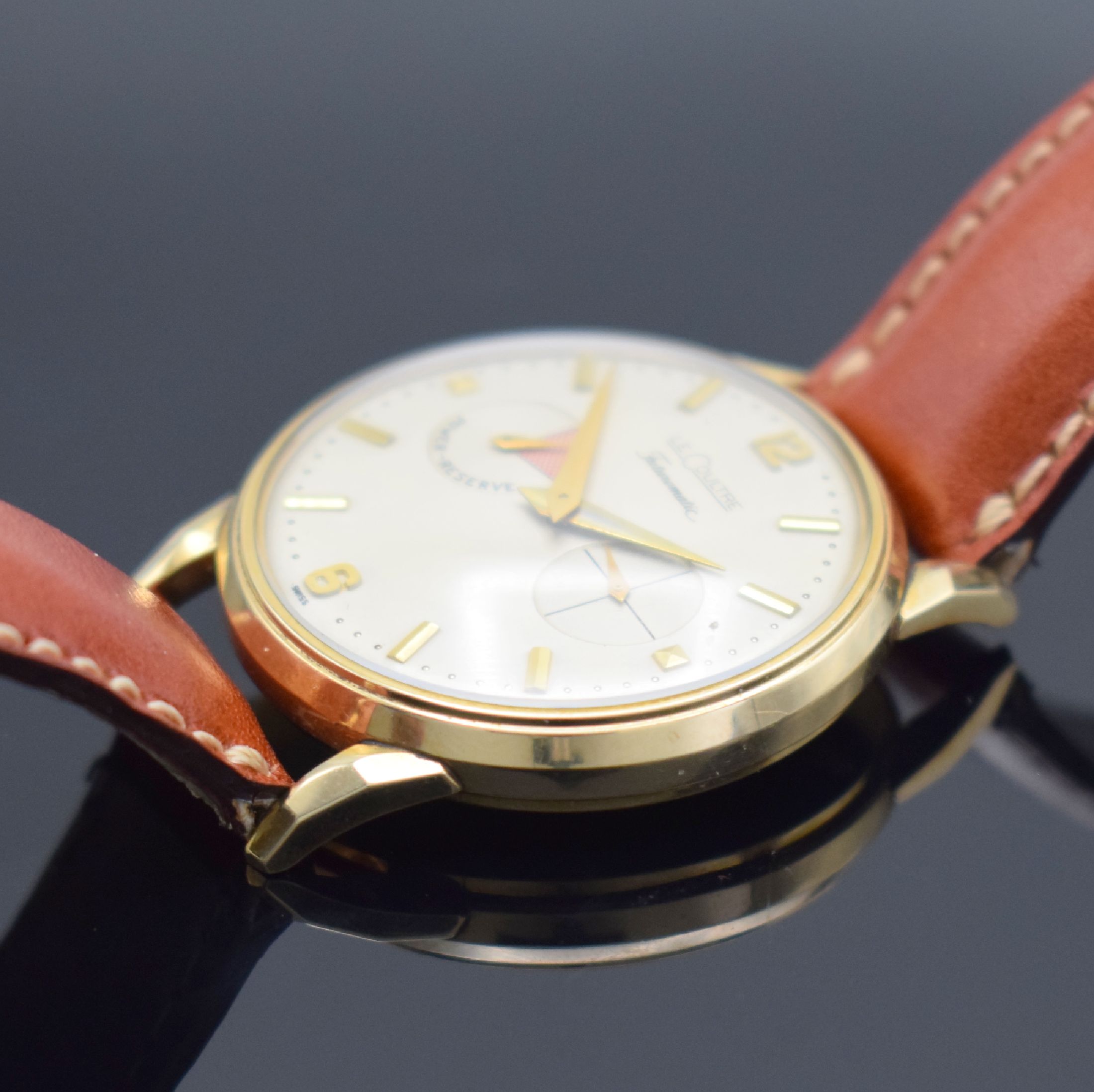 Detail b: LeCoultre Futurematic Herrenarmbanduhr, Schweiz f. US-Markt um 1960, Hammerautomatik, 2-teil. Geh. in 10k gold filled, Boden aufgedr., silb. rest. ...