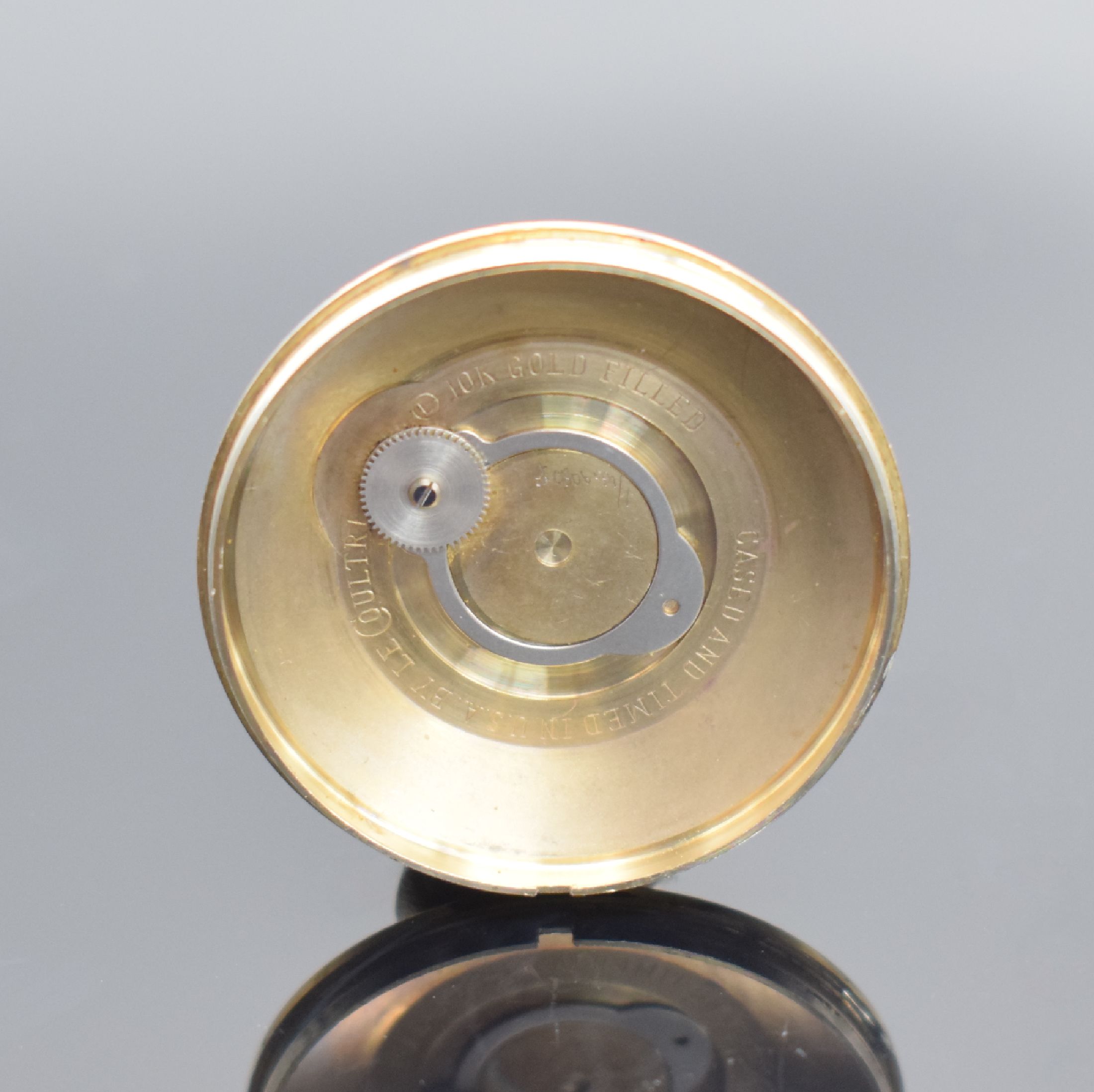 Detail e: LeCoultre Futurematic Herrenarmbanduhr, Schweiz f. US-Markt um 1960, Hammerautomatik, 2-teil. Geh. in 10k gold filled, Boden aufgedr., silb. rest. ...
