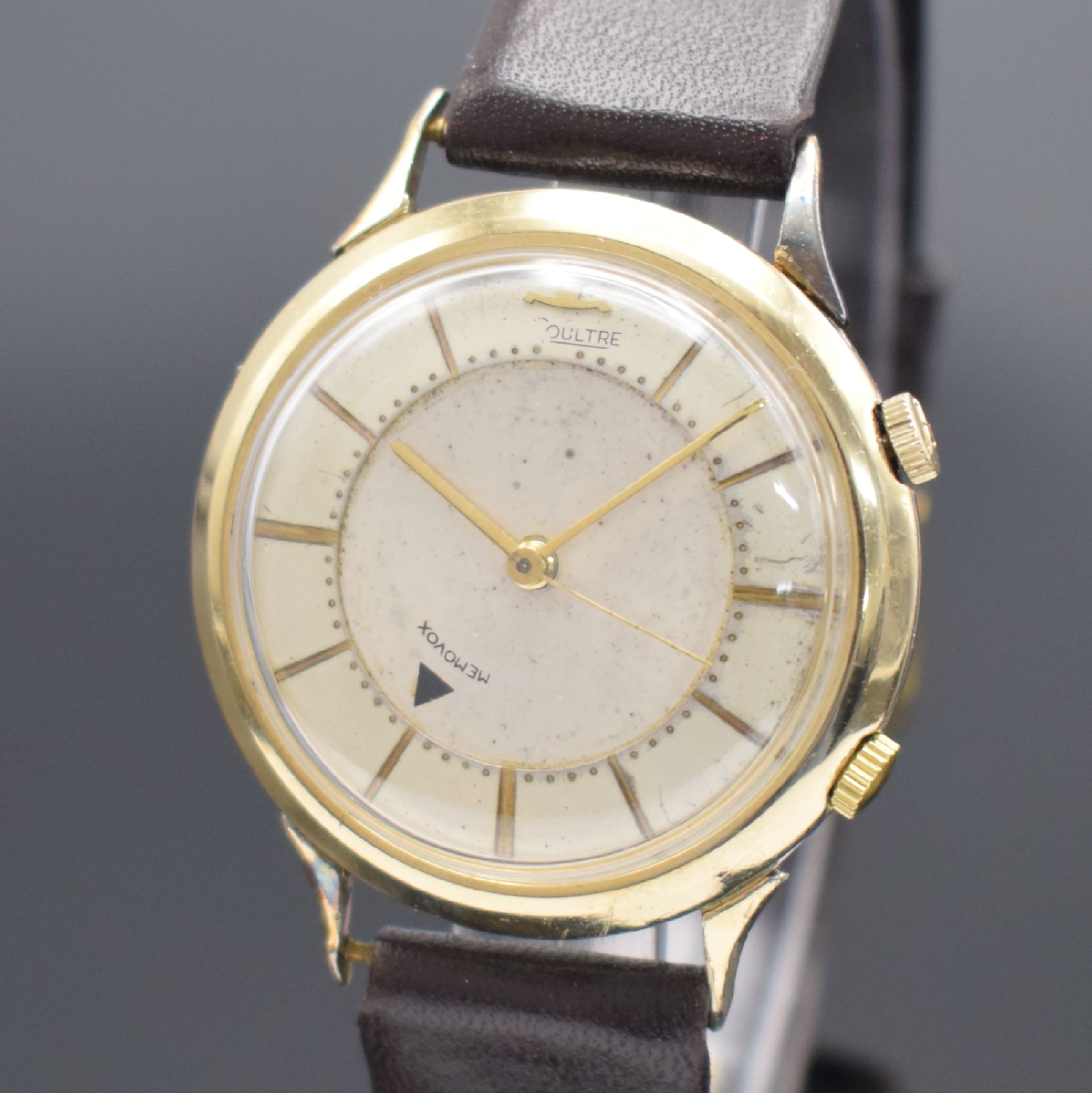 Detail a: LeCoultre Memovox Armbanduhr mit Kaliber 814, Schweiz um 1955, Handaufzug, Stahlgeh., Lünette in 10k gold filled aufgedr., 2-teil. silb. Zifferbl., ...