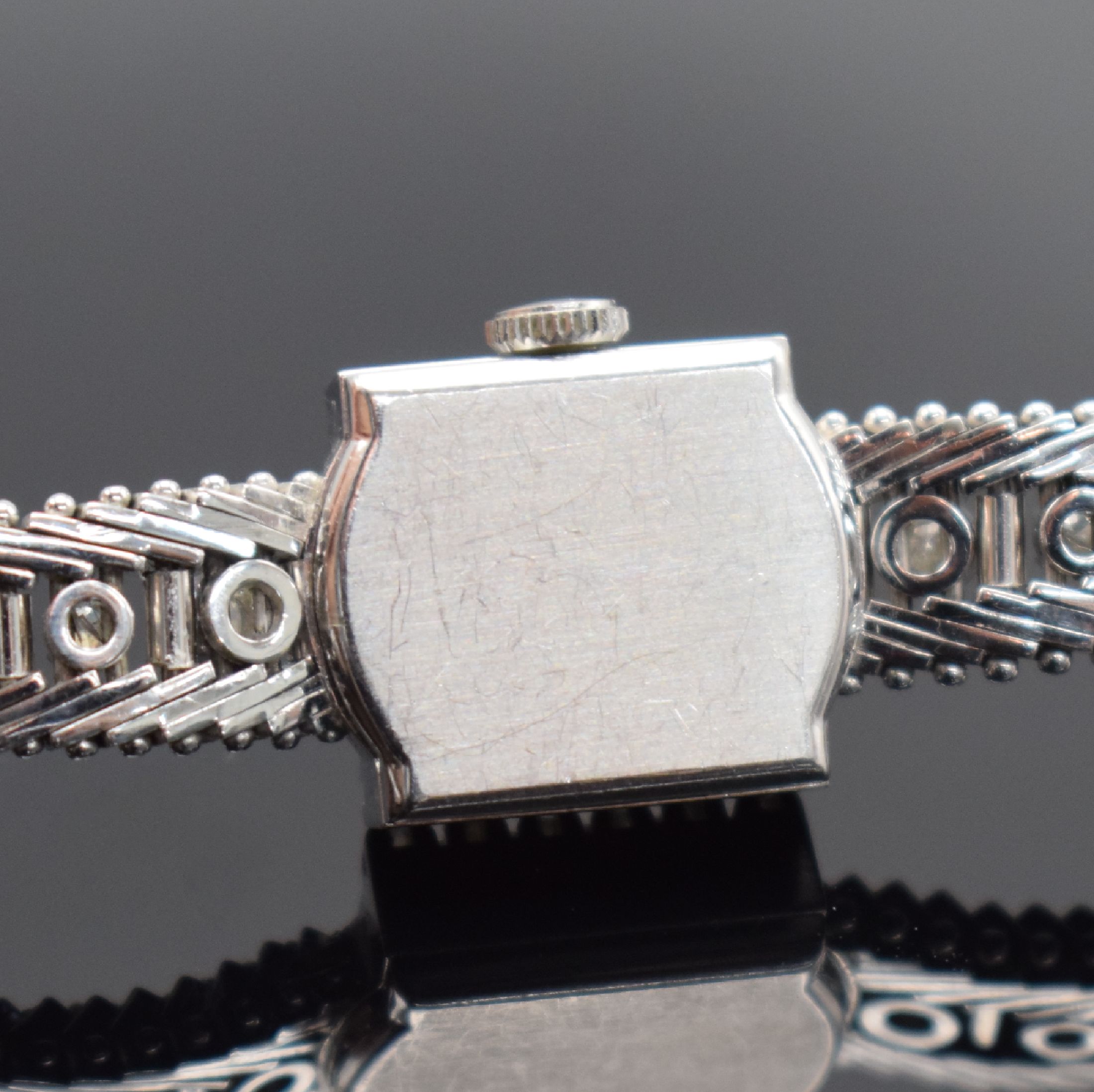 Detail d: ANKER Damenarmbanduhr in WG 585/000 mit Diamanten, Schweiz um 1965, Handaufzug, Boden aufgedr., silb. Zifferbl. m. silb. Std. Ind. & Zeigern, Kal. AS ...