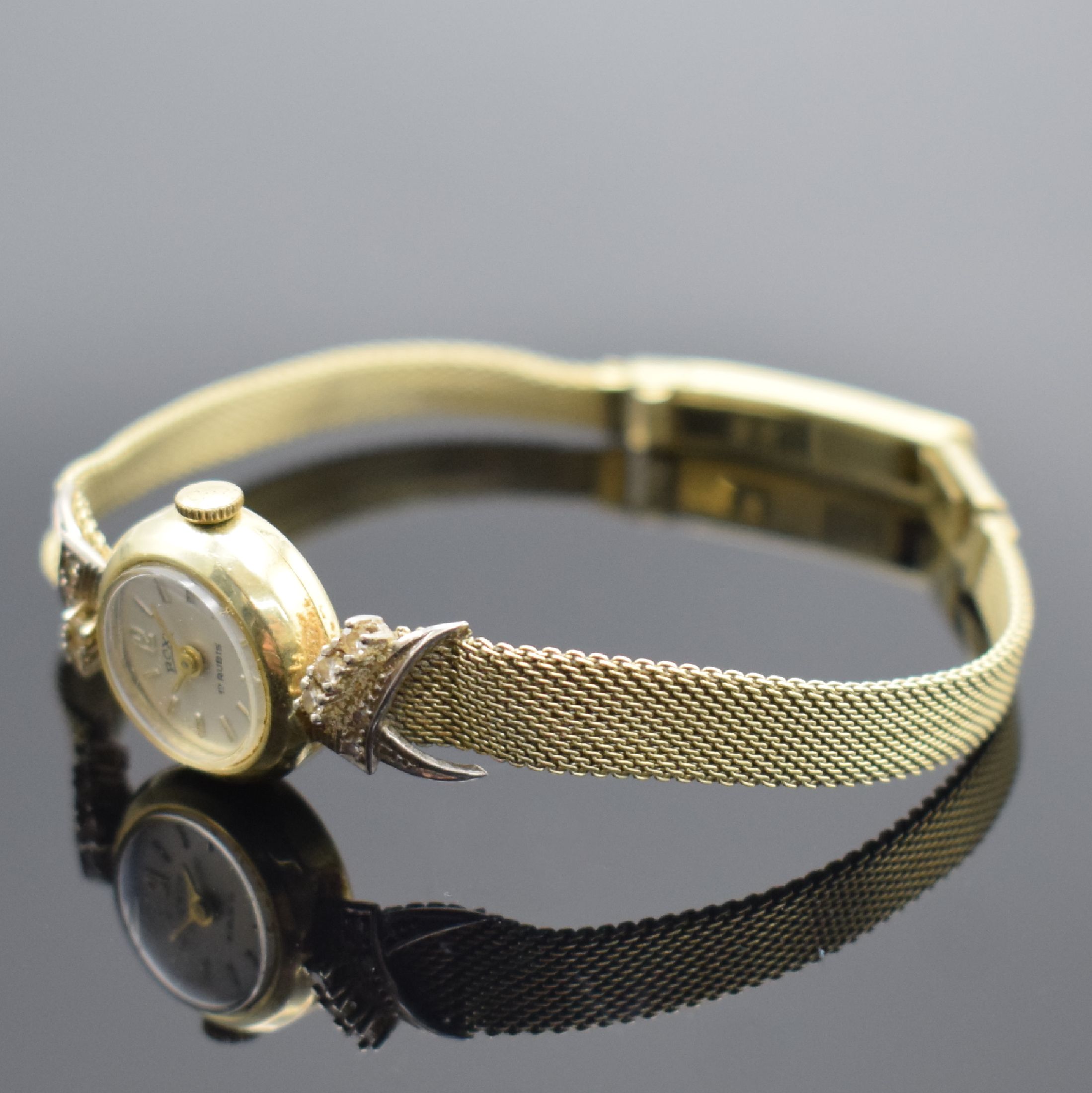 Detail b: ROXY Damenarmbanduhr in GG 585/000 mit Diamanten, Schweiz um 1965, Handaufzug, Geh. an Goldband in GG 585/000, Boden aufgedr., silb. Zifferbl. m. ...