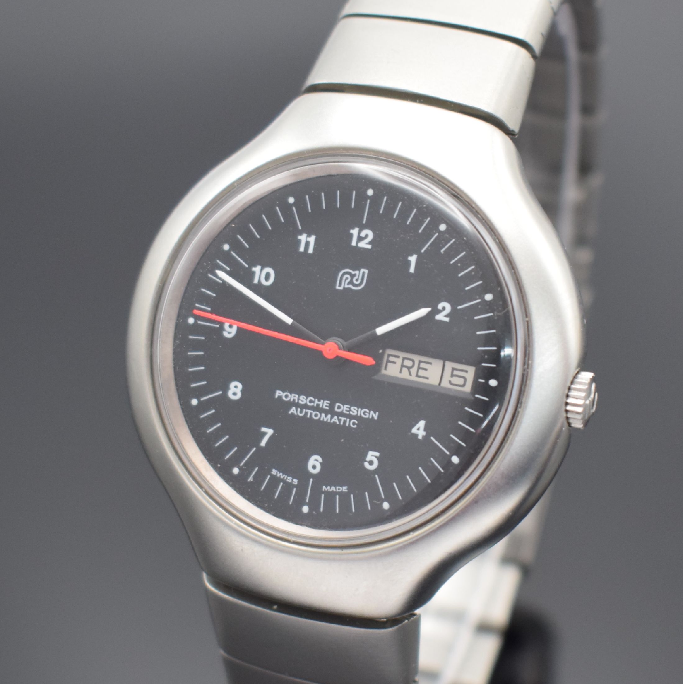 Detail a: PORSCHE DESIGN / ORFINA Herrenarmbanduhr in Stahl, Schweiz um 1990, Automatik, matt. Geh., Boden verschr., orig. Stahlband m. Faltschl., schwarzes ...